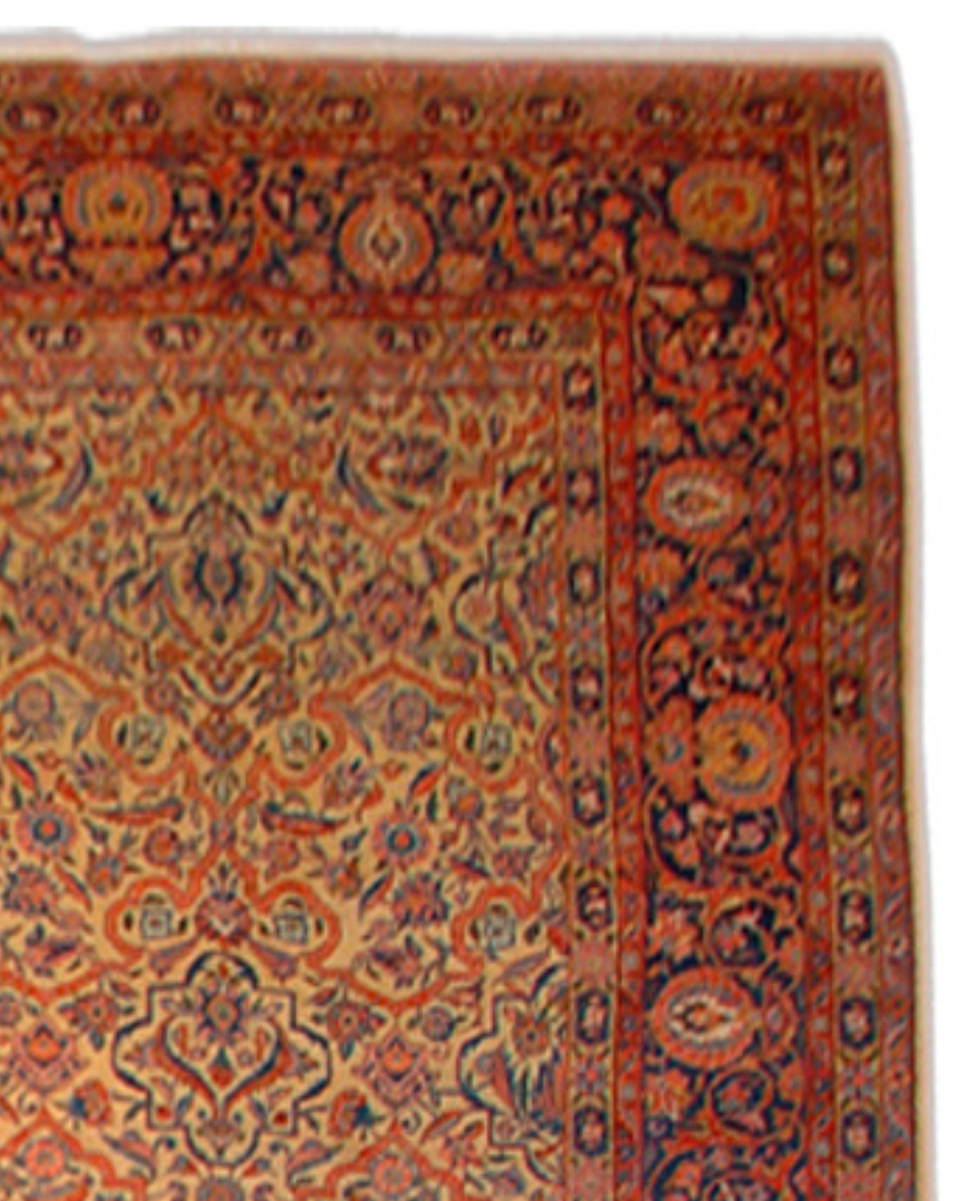 Antique Large Persian Kashan Rug, Early 20th Century

Against a pleasant golden ground, this Kashan carpet draws an allover umber-red lattice network that forms alternating diamonds and quatrefoils. Alternating within rows of the lattice are lobed