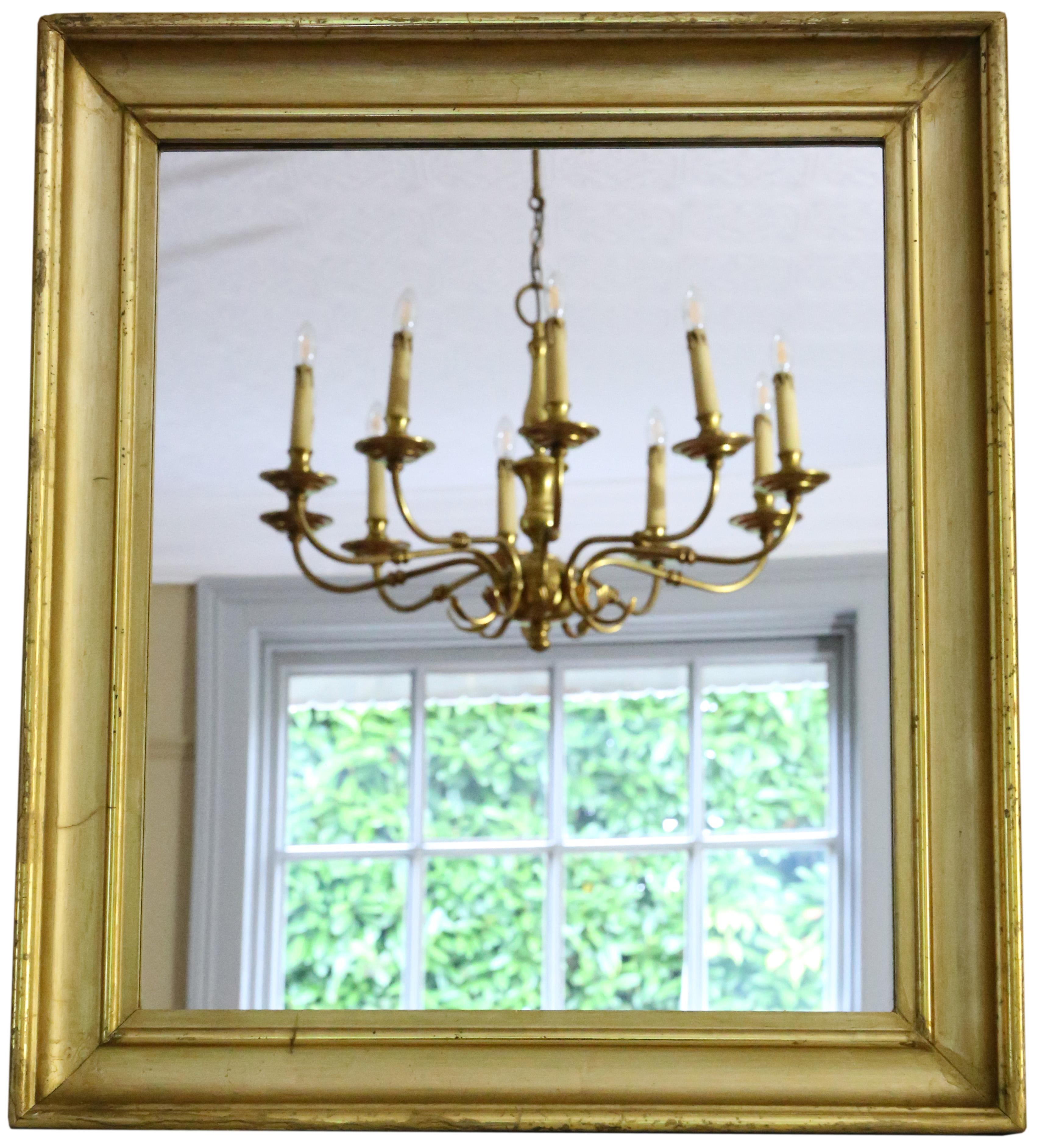 Antique C1900 large quality gilt overmantle wall mirror. Lovely charm and elegance.

This is a lovely, rare mirror. A bit different and quite special.

An impressive find, that would look amazing in the right location. No loose joints or