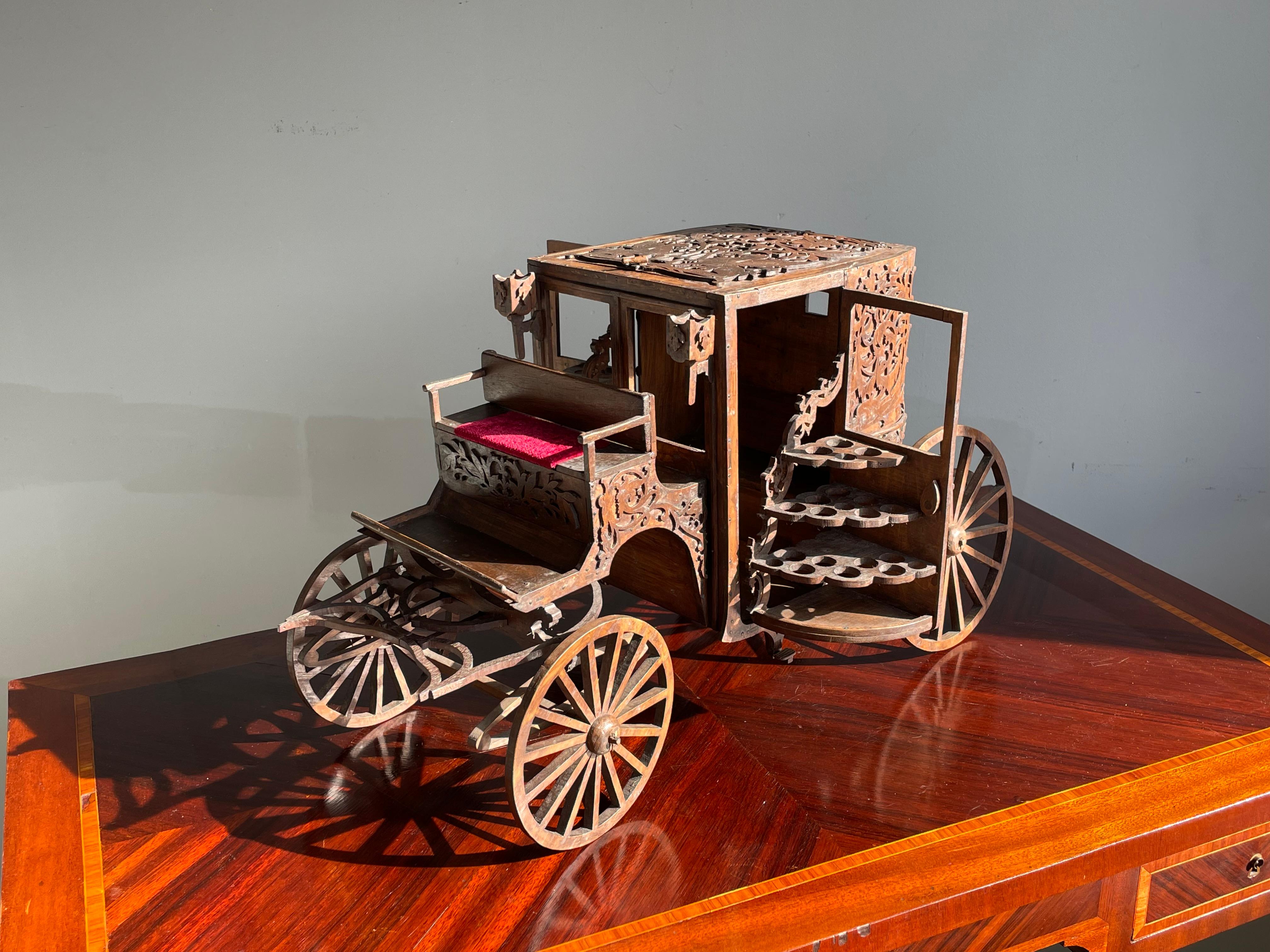Large, masterly hand-crafted and amazing condition wooden antique coach cigar holder.

If you are a collector of truly unique antiques in general and of cigar or carriage related pieces in particular then this one of a kind centerpiece could be