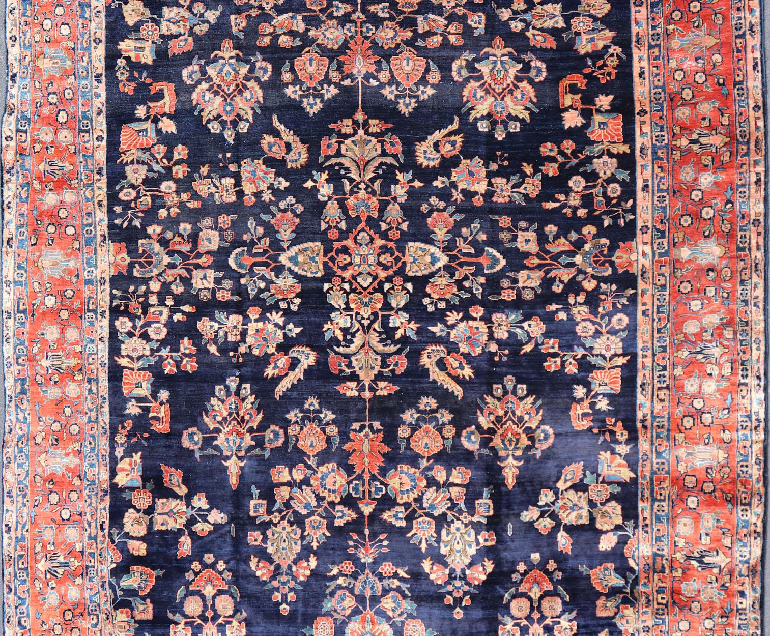 Persian Antique Large Sarouk Faraghan Rug with Floral Pattern in Navy and Orange-Red For Sale