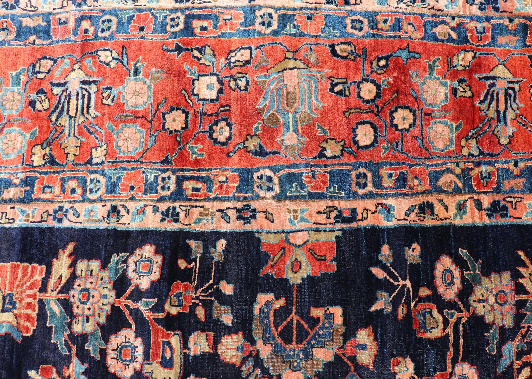 Hand-Knotted Antique Large Sarouk Faraghan Rug with Floral Pattern in Navy and Orange-Red For Sale
