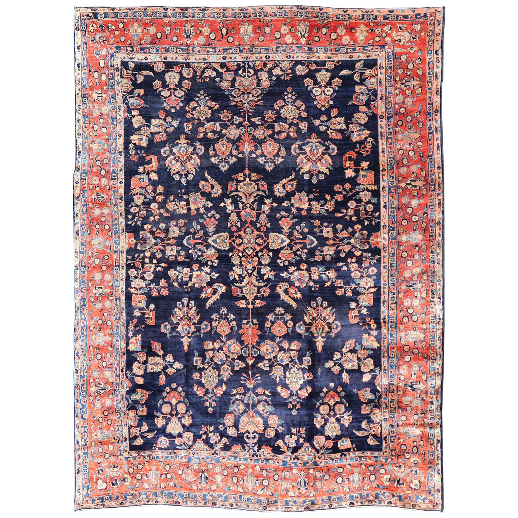 Antique Large Sarouk Faraghan Rug with Floral Pattern in Navy and Orange-Red For Sale