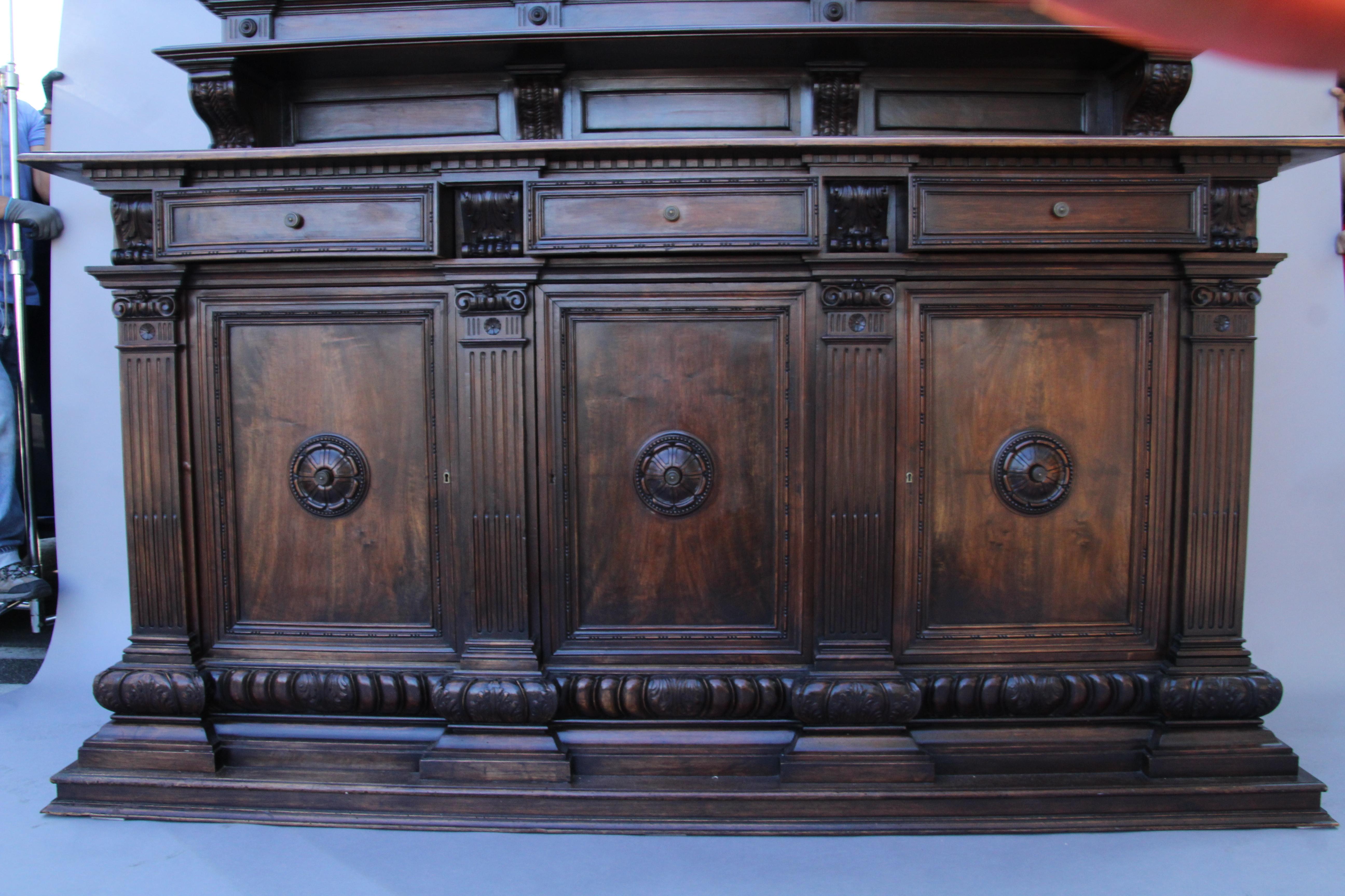 Imposing large-scale buffet. Carved walnut. Great condition. Someone did put a hole in back at one point. Measures: 67.5