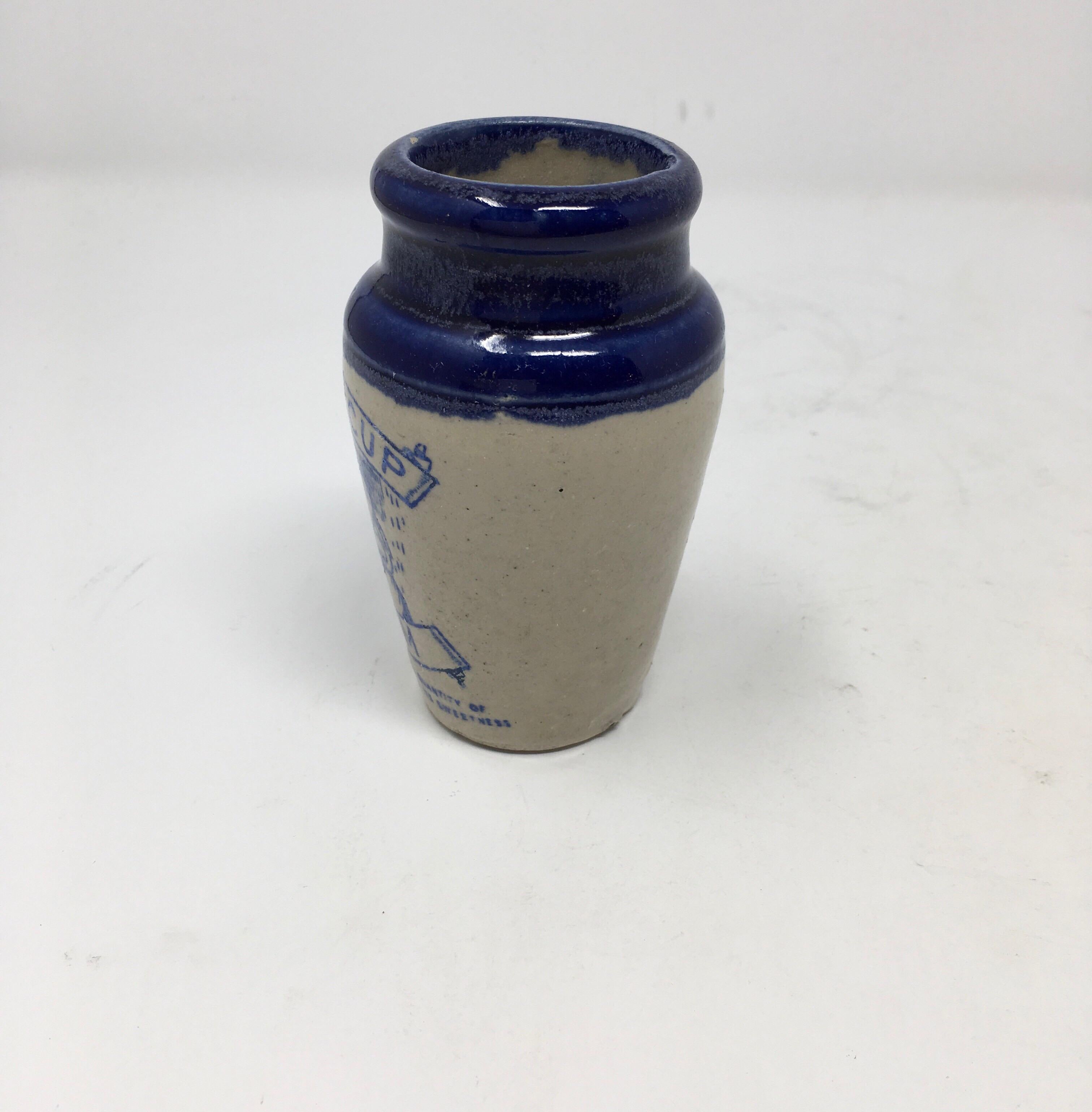 Found in England, this Scottish stoneware buttercup cream advertising pot has a beautiful cobalt blue top, cobalt transfer print and a pictorial of a milk maid and cow. The pot measures approx. 4.25 inches high and is in good condition.
