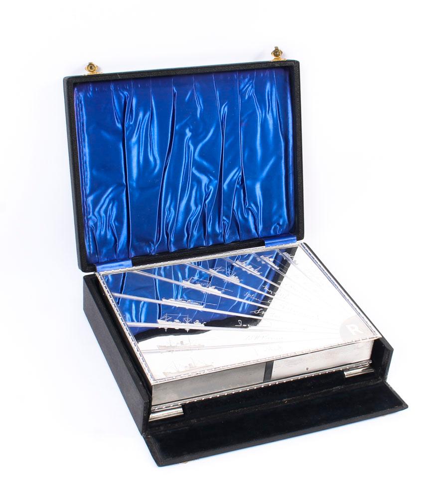 An impressive large antique sterling silver Art Deco Presentation cigar / card / jewelry box with hallmarks for Birmingham 1937 and the makers mark of the famous silversmith Thomas Spicer.
 
The hinged top is engraved with diagrams of nine naval