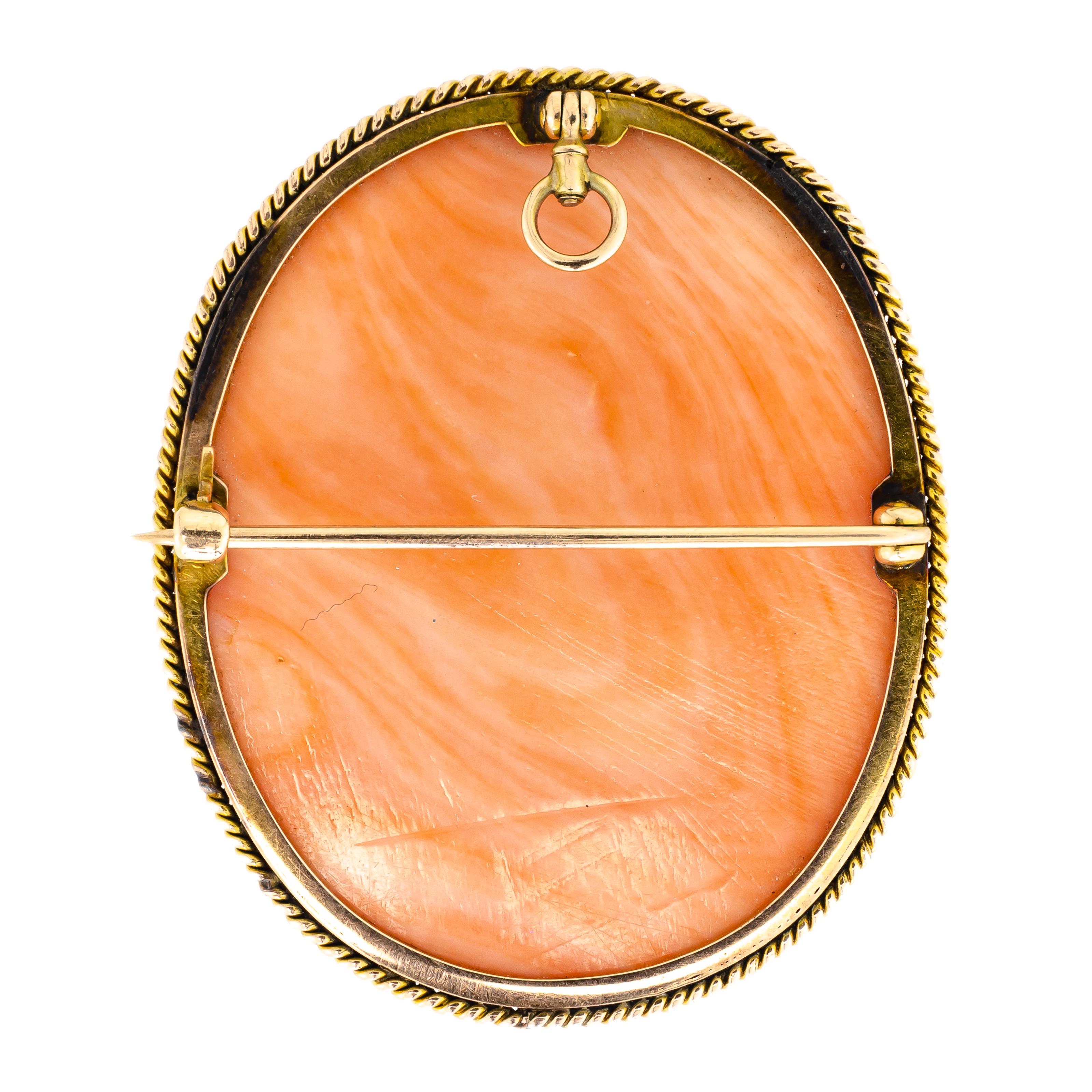 Exquisite large size coral cameo of the Goddess Diana in Profile mounted in rope-twist design 14kt yellow gold frame with retractable bail so it can be worn as a pendant - all original fittings Antique Victorian piece - rendered with fine details