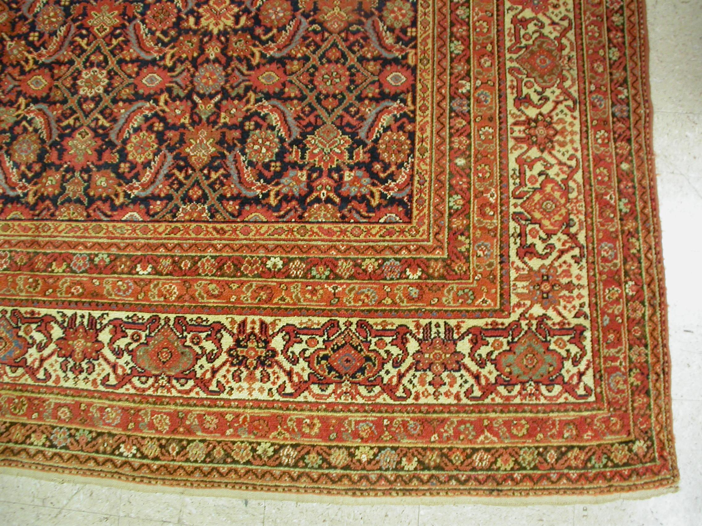 This is a fine example of a large square Antique Malayer dating from the 1910-1920s measuring: 13.8 x 13.10 ft.

Antique Malayer rugs were woven in the small town of Malayer, located south of Hamedan on the road to Arak. The location in relation