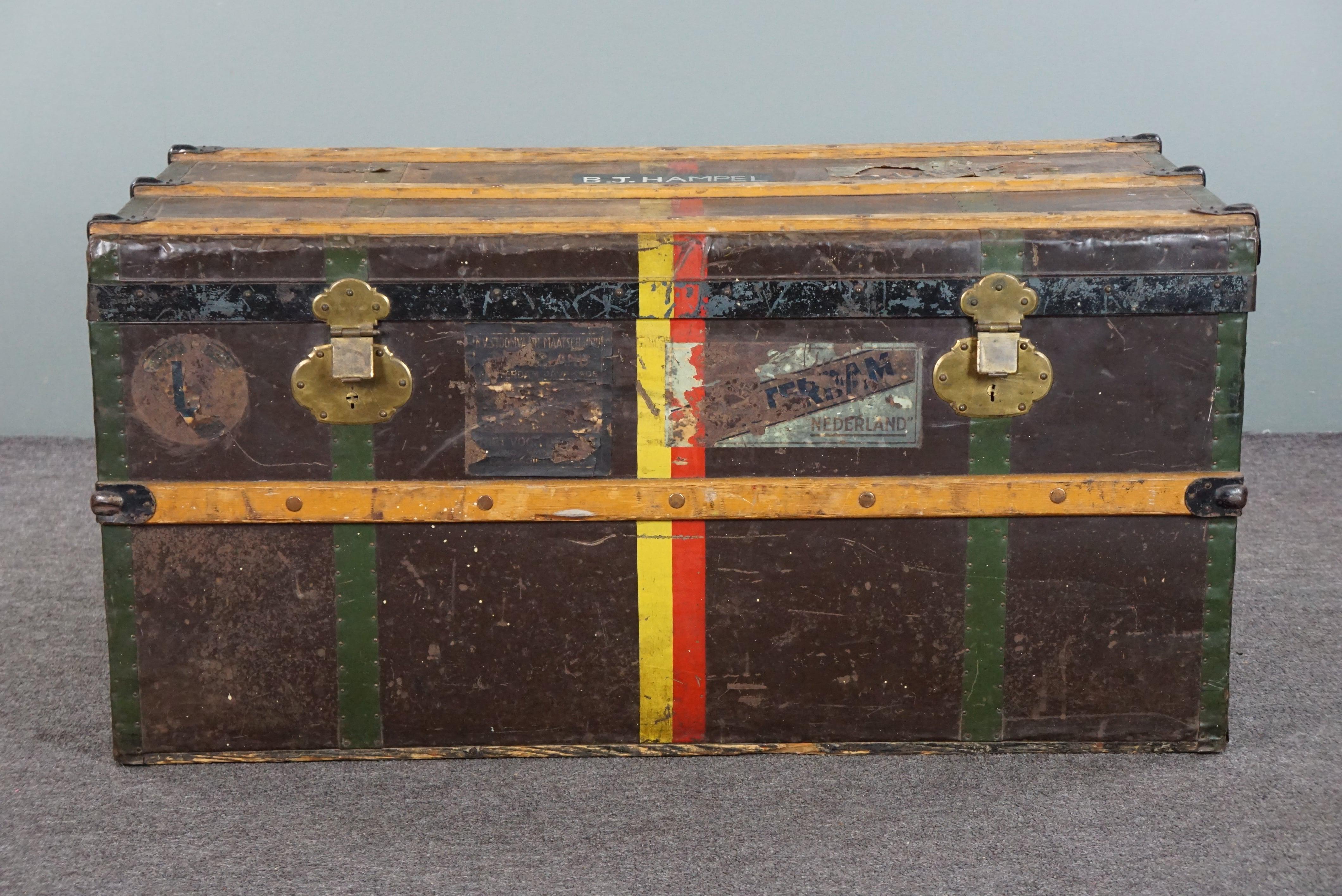 Antique large travel suitcase with fantastic colors and original labels. In Fair Condition For Sale In Harderwijk, NL