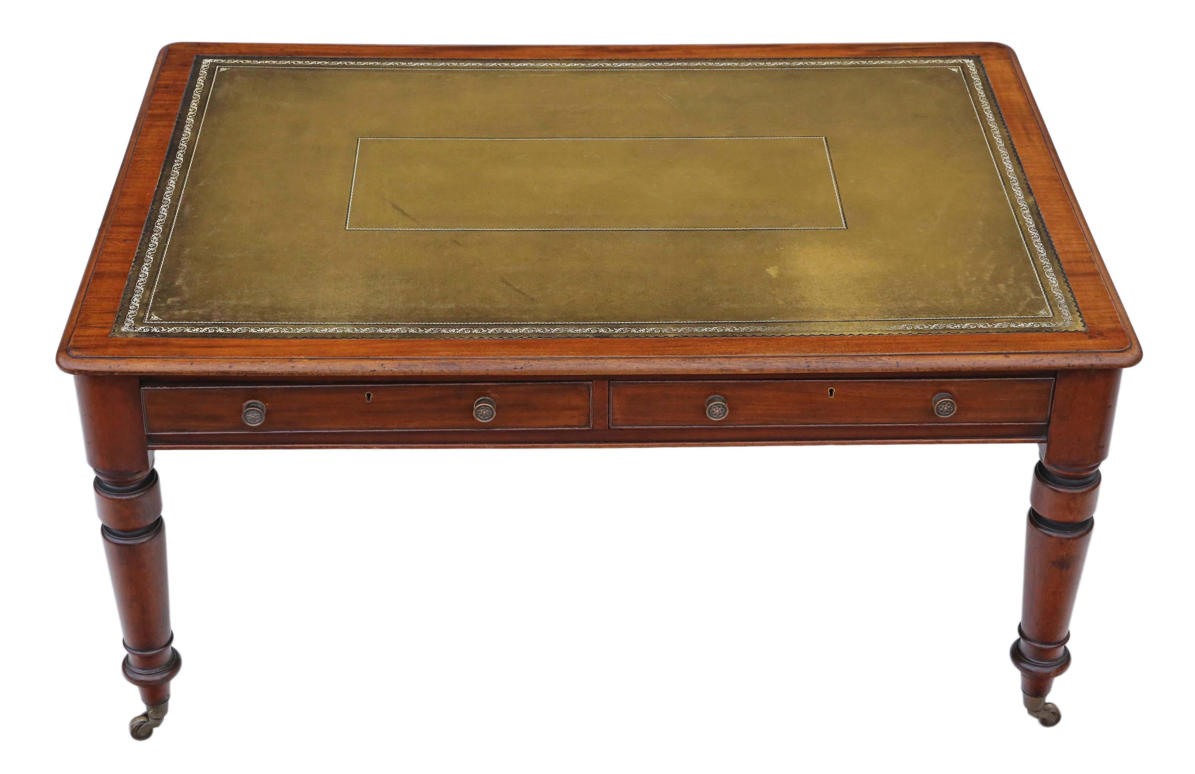 Antique fine quality large Victorian 19th century circa 1890 mahogany partners' writing desk table.

Two large drawers to each side.

Patinated tooled leather writing surface. Stands on large brass cup castors.

Solid and no loose joints and