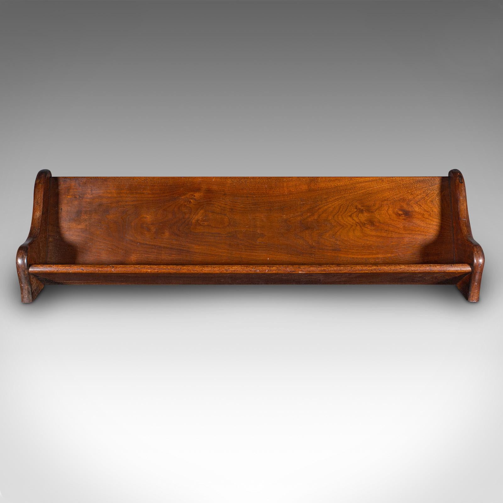 
This is an antique large volume book trough. An English, walnut country house library bookrest, dating to the Victorian period, circa 1880.

Superior proportion book rest, for keeping larger volumes at hand
Displays a desirable aged patina and in