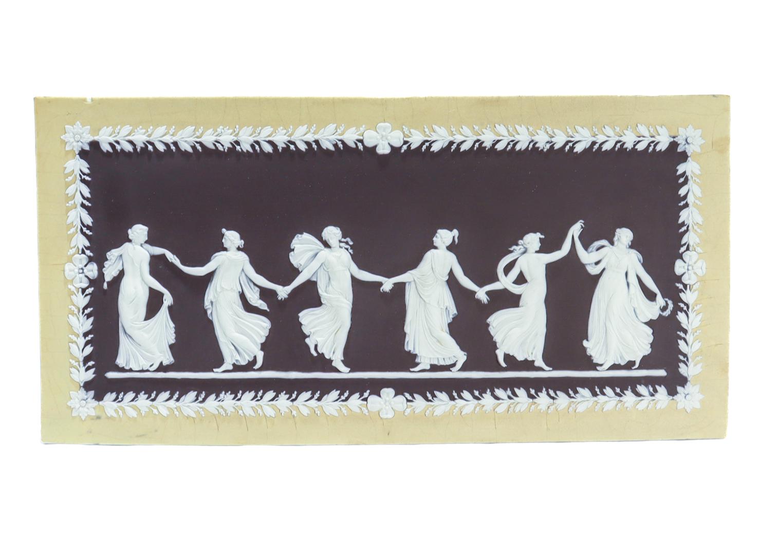 A fine antique Wedgwood jasperware plaque.

In the Dancing Hours pattern.

In three colors including a yellow border, white applied cameo decoration, and a black center.

Marked to the reverse with an impressed WEDGWOOD (only) mark.

Dating to the