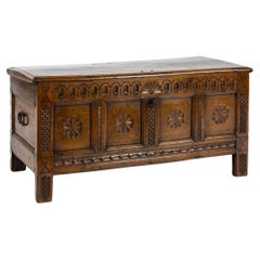 Antique late 17th century English honey color chest or trunk with rich carvings