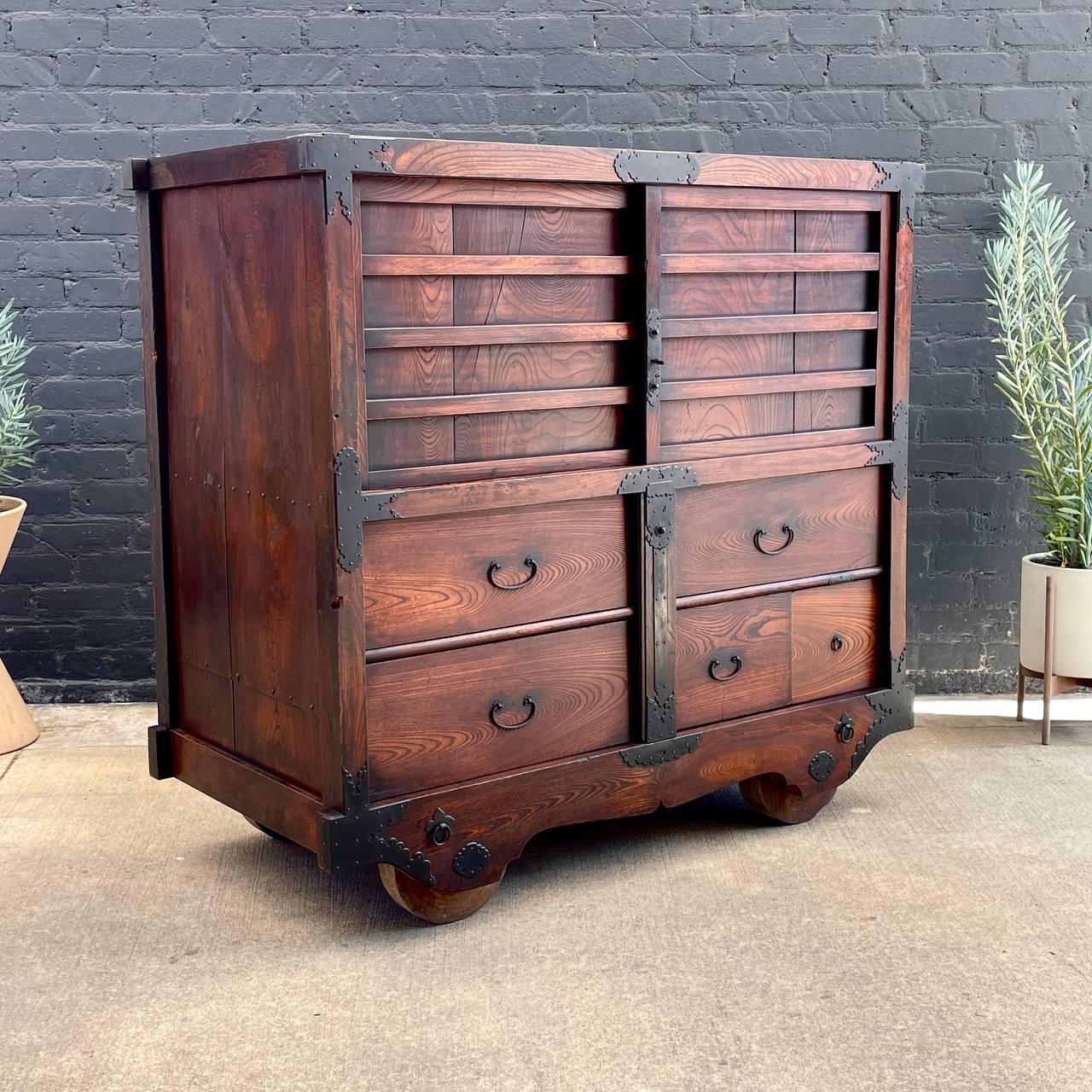 Antique Late 1800’s Japanese Rolling Tansu Chest of Drawers Dresser 

Country: Japan
Materials: Wood, Iron
Condition: Original Condition
Style: Japanese Antique
Year: 1890’s

$4,895

Dimensions:
60”H x 62.50”W x 31.50”D