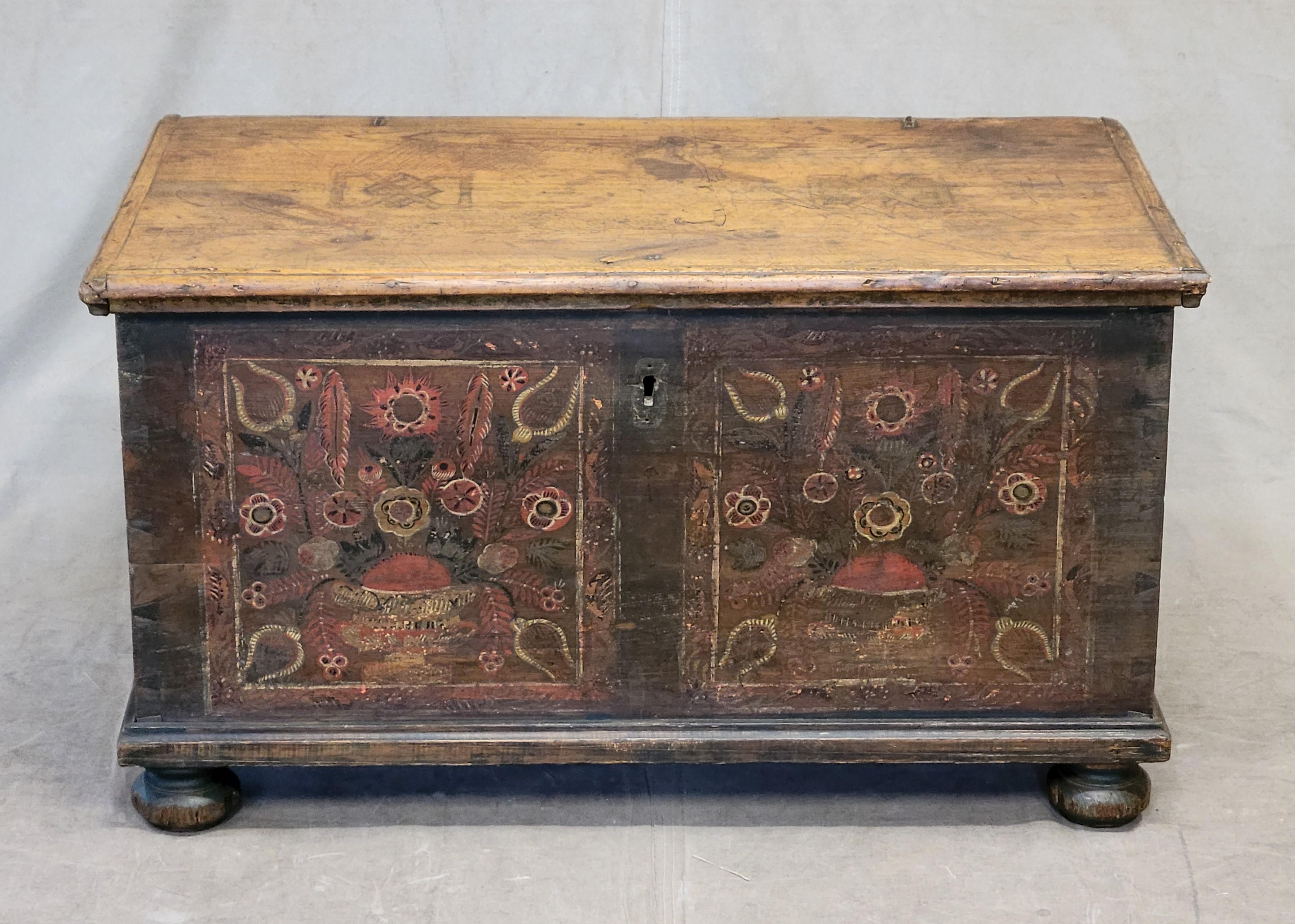 A gorgeous, antique late 1800s rustic Romanian painted pine blanket chest. Perfect as a coffee table, accent piece in a bedroom, or even use as a bench in an entryway.
Condition commensurate with age and use. Paint is abraded, particularly on one