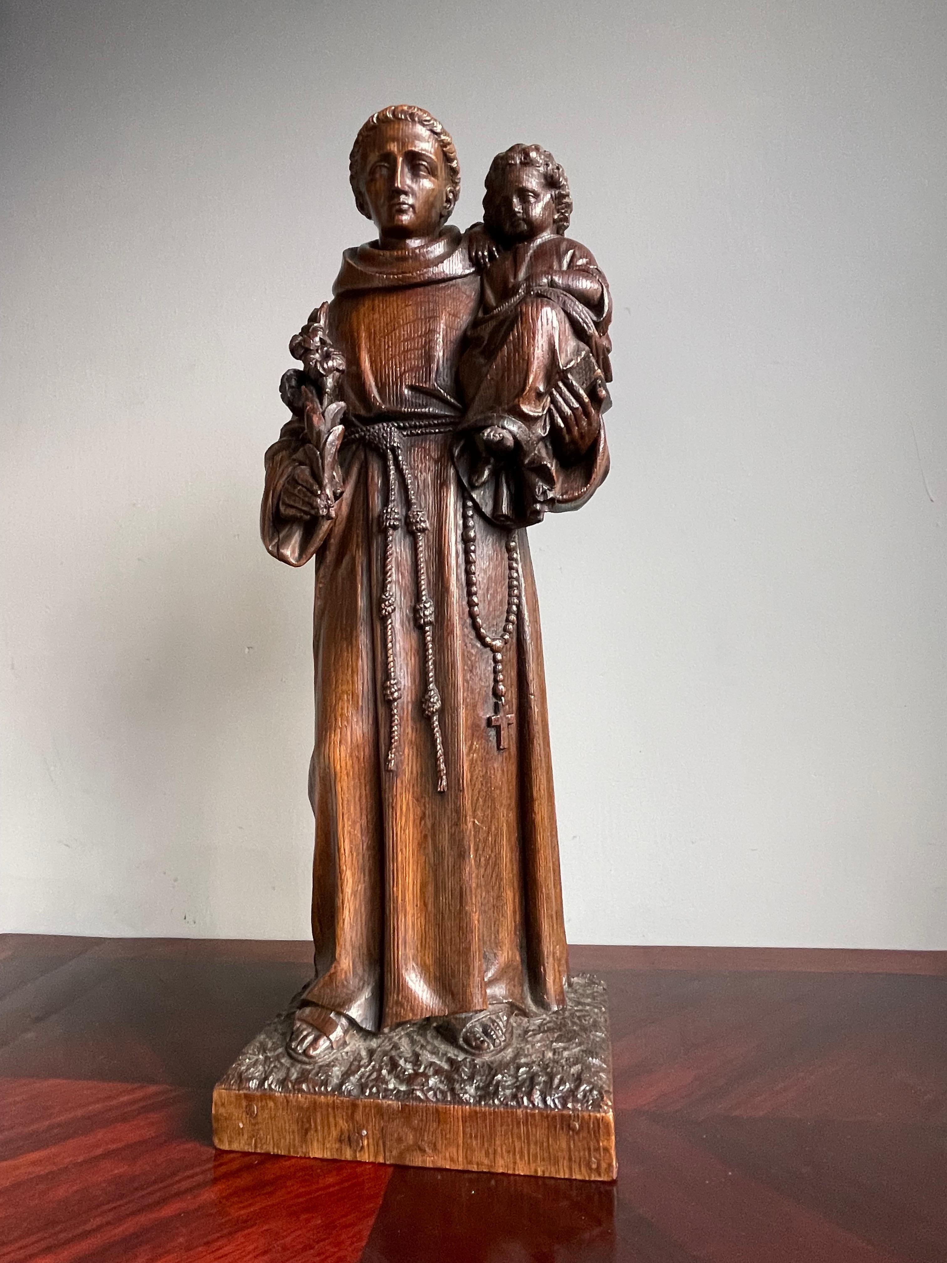 Top quality carved and good size Saint Anthony sculpture.

This beautiful quality sculpture of Saint Anthony is in very good condition. Saint Anthony is commonly shown holding the Child Jesus, who is often on a bible, with one or more madonna lilies