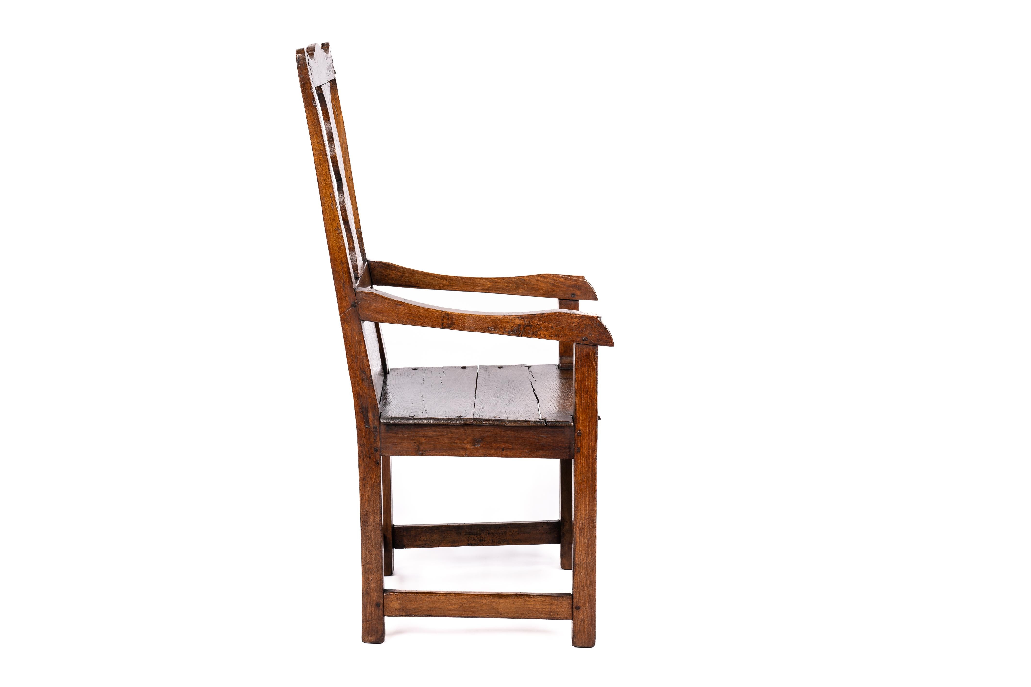 Polished Antique Late 18th Century Dutch Oak and Beechwood Dark Honey Color Armchair For Sale