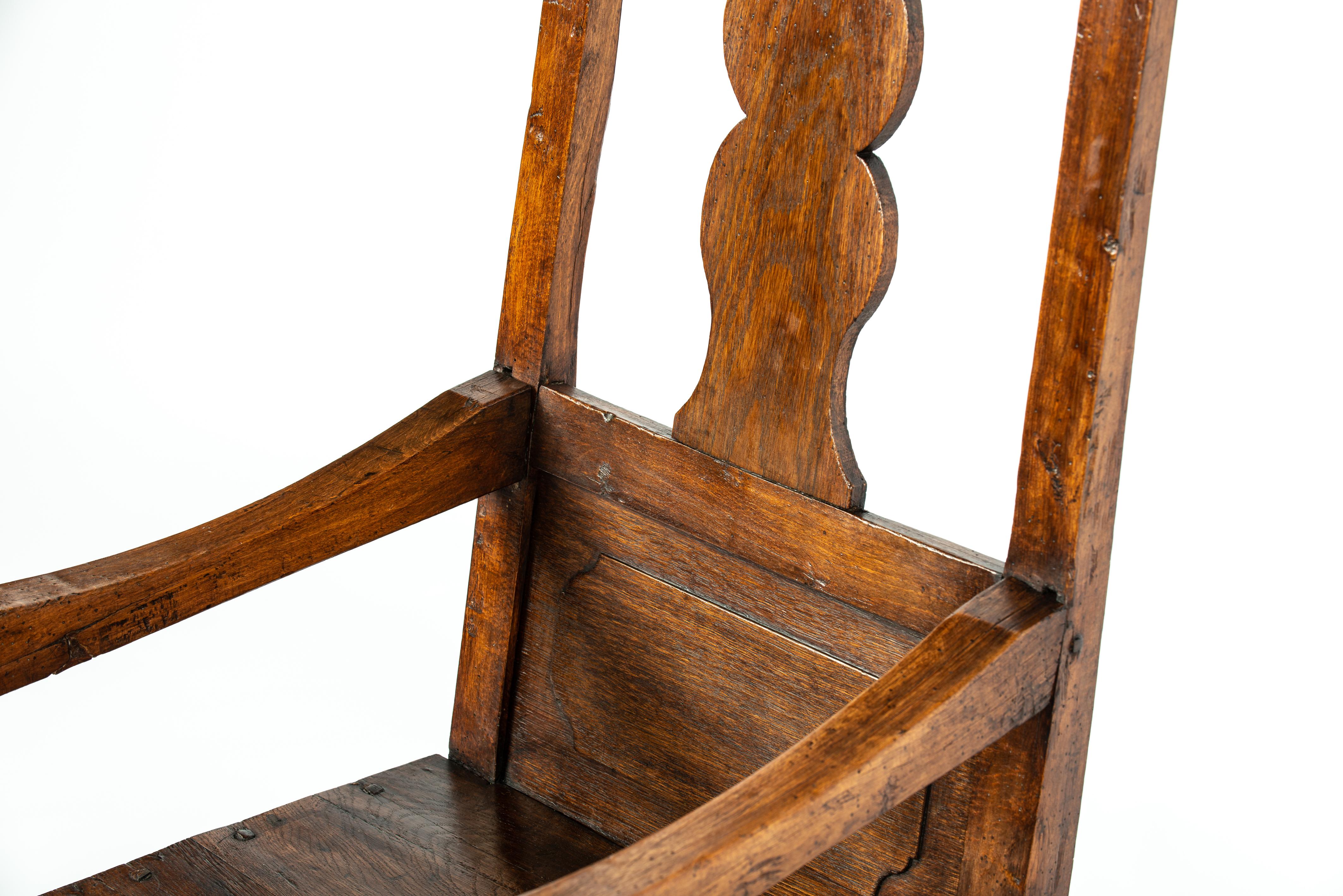 Antique Late 18th Century Dutch Oak and Beechwood Dark Honey Color Armchair For Sale 4