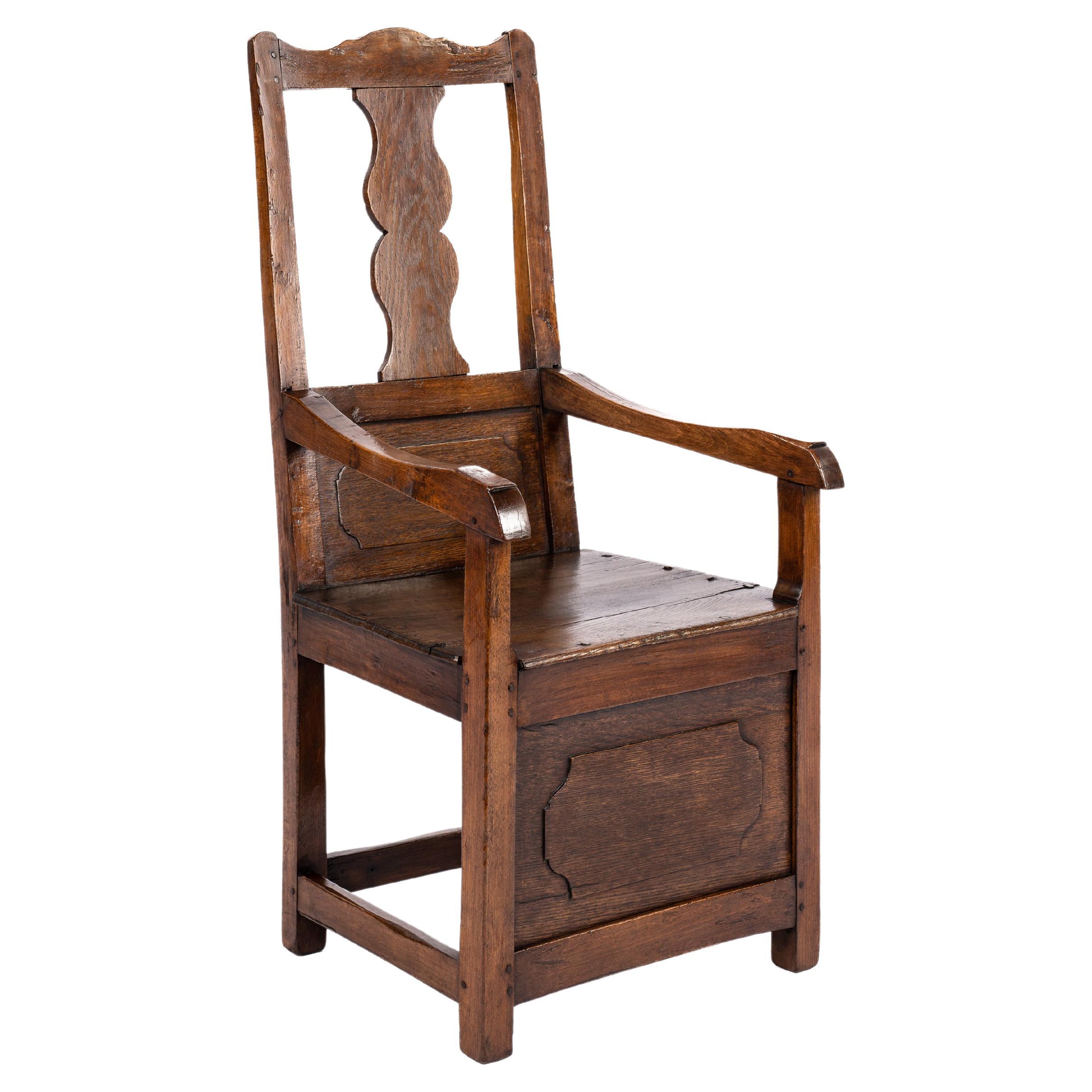 Antique Late 18th Century Dutch Oak and Beechwood Dark Honey Color Armchair For Sale