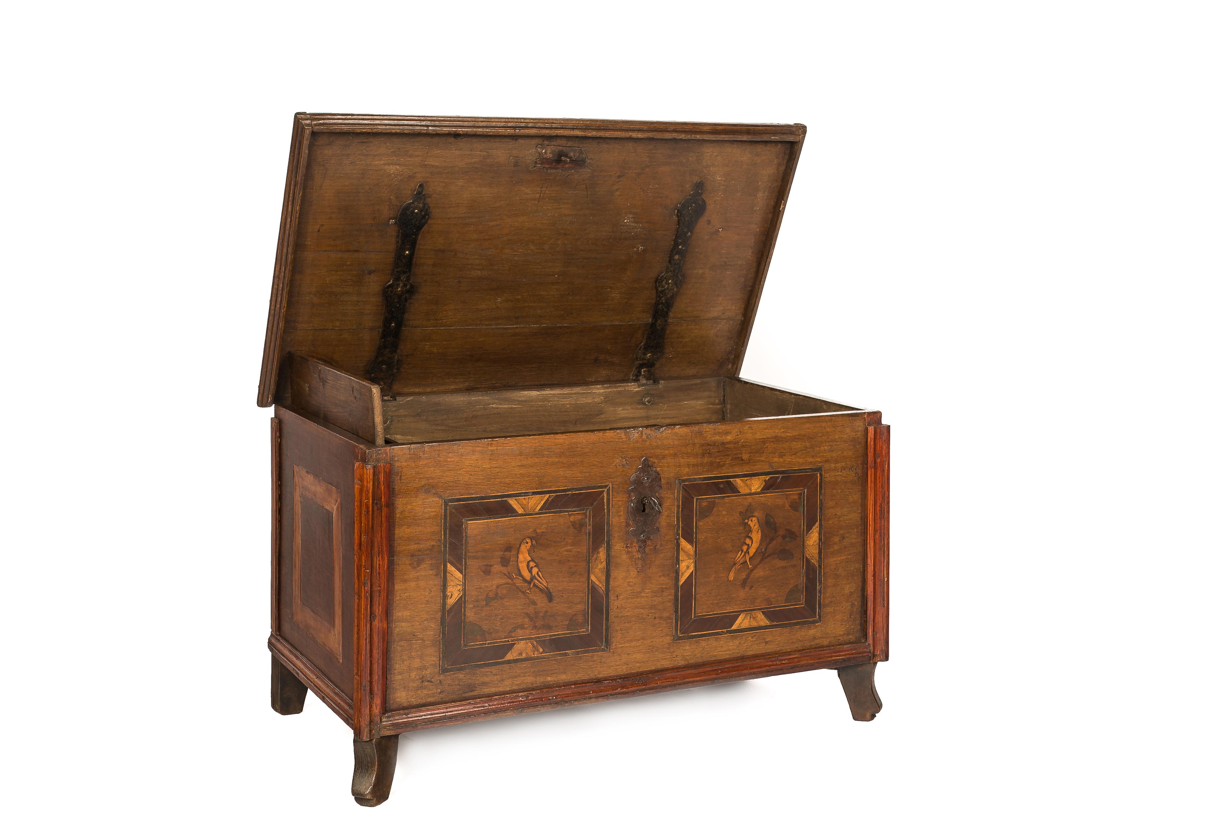 This rural trunk was made in the countryside of eastern Germany in the late 18th century. The trunk or chest was completely made in solid European summer oak. All four sides and lid were made from a single board of oak timber. The front of the piece