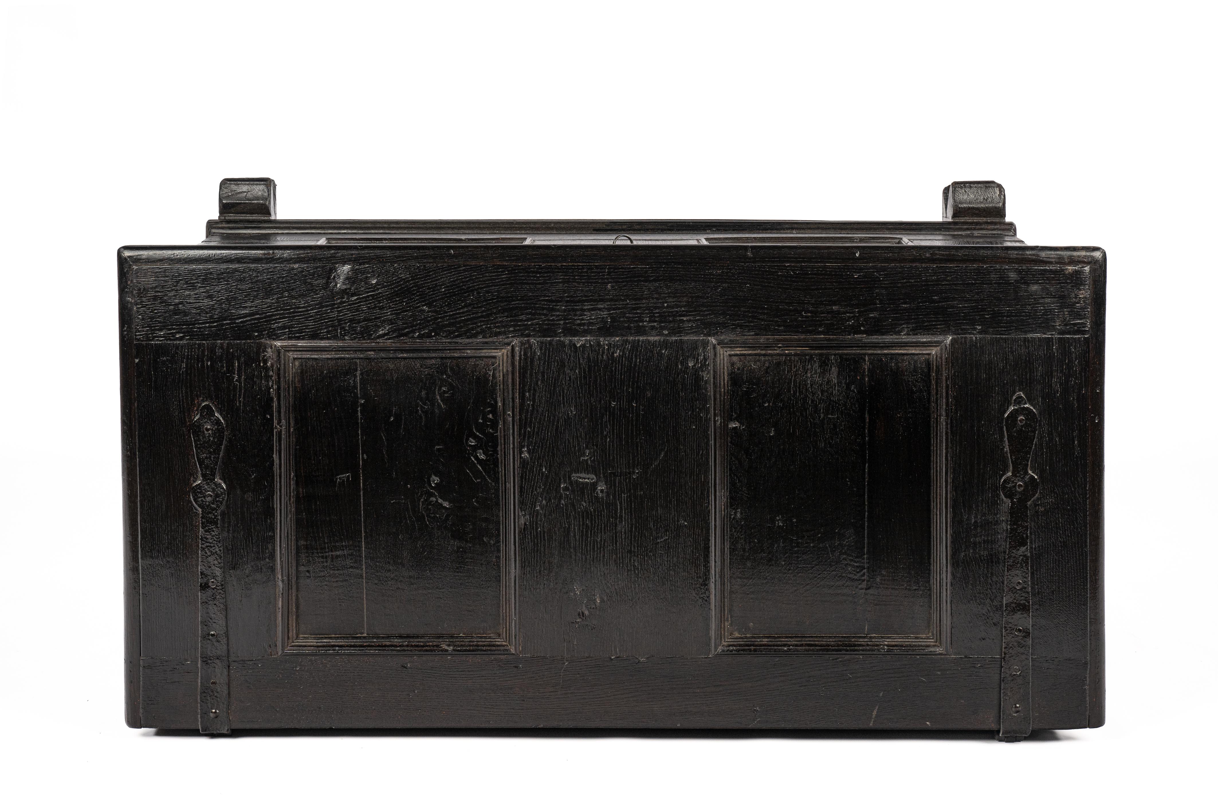 18th Century  Antique late 18th century German Solid black Oak panelled trunk or coffer For Sale