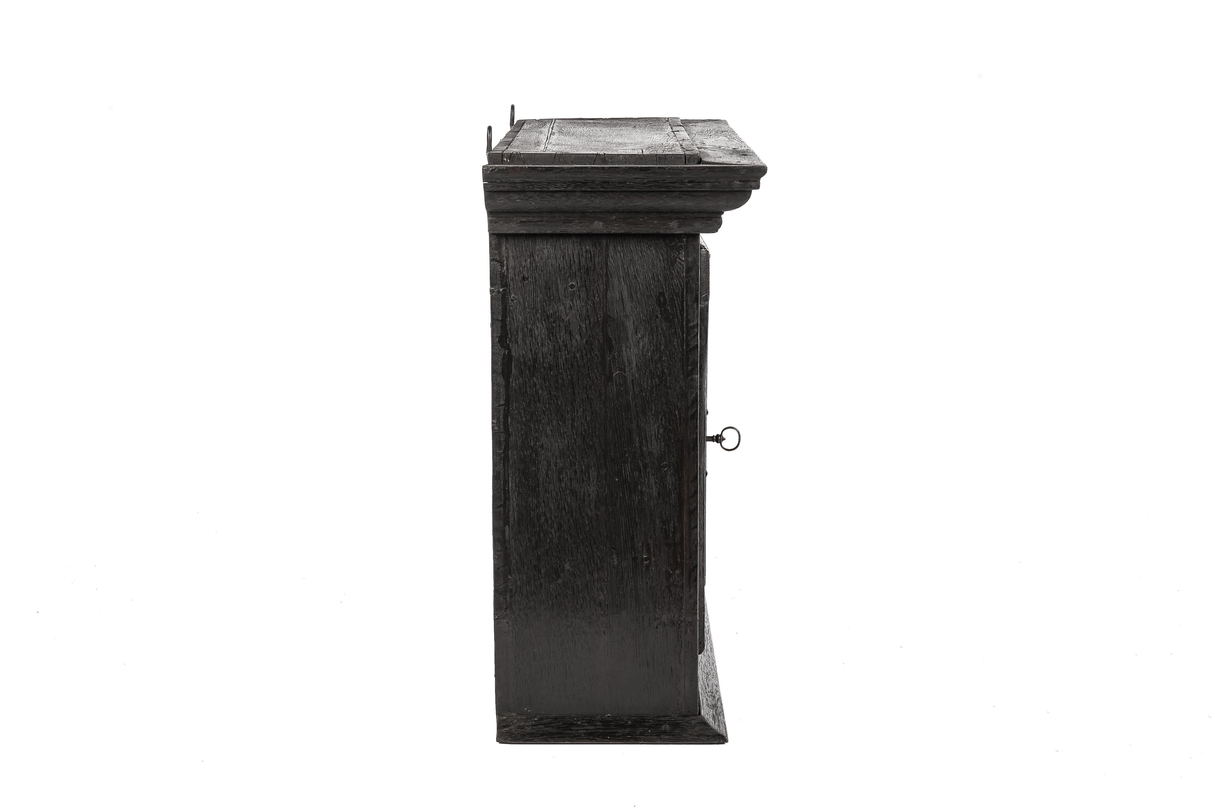 Forged Antique Late 18th Century German Solid Black Oak Wall Hanging Cabinet For Sale