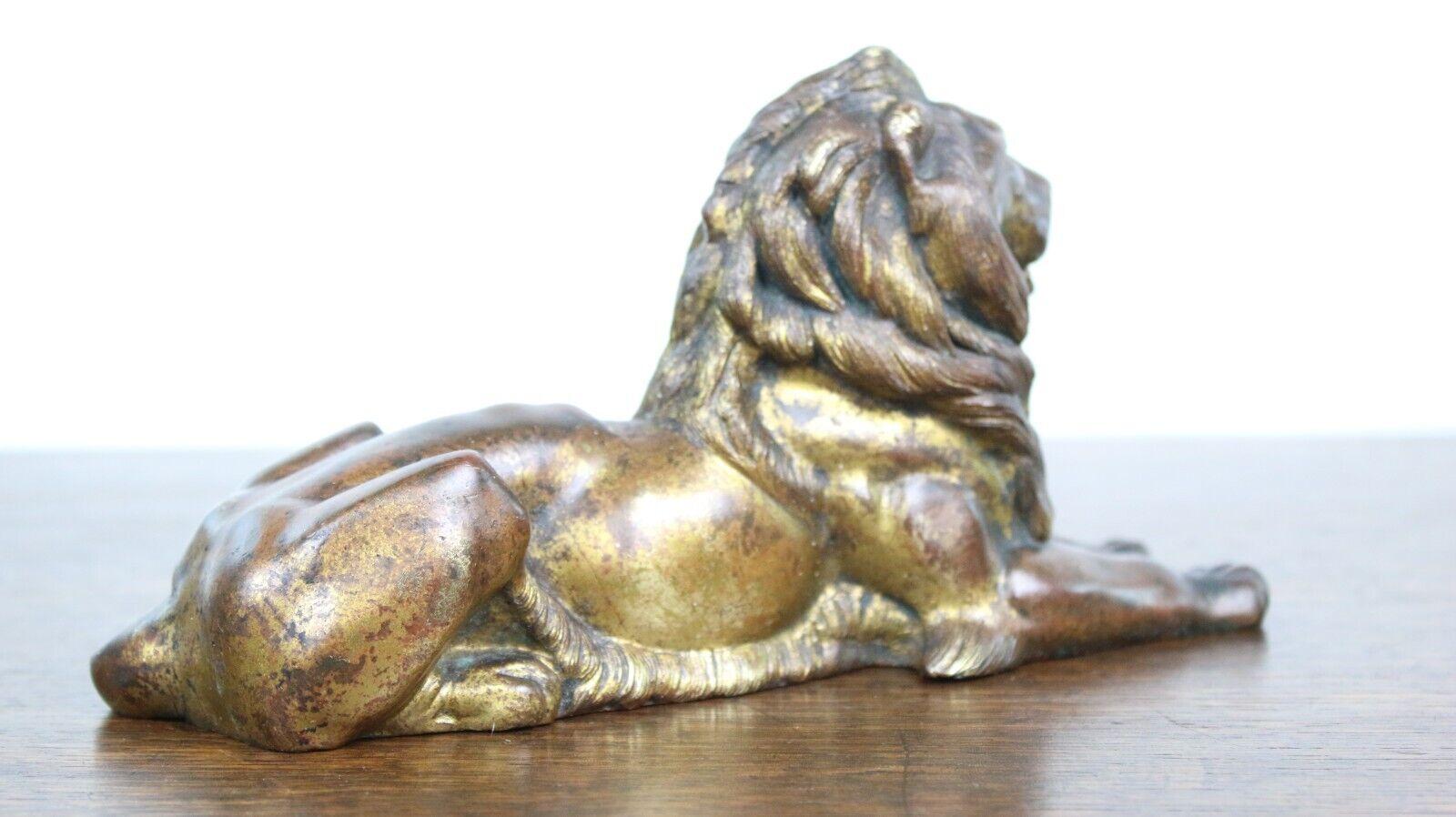A Gold Cast Lion

A fabulous late 19th century gold Lion.

A recumbent Lion suitable for the desk or as a feature on a bookcase. 

Condition:

In original antique condition.

Dimensions (cm):

10H x 20W x 6D