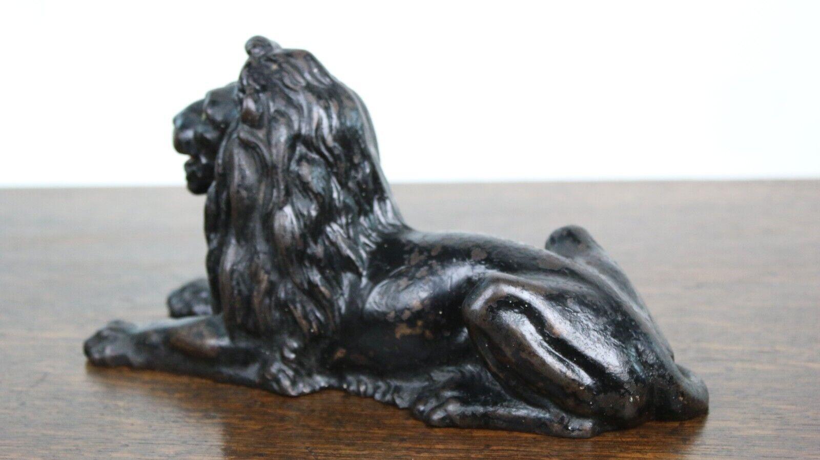 Metal Antique Late 19th Century Cast Recumbent Lion For Sale