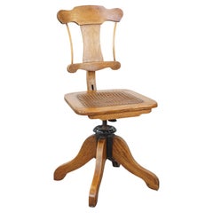 Antique late 19th century English office chair with reclining backrest