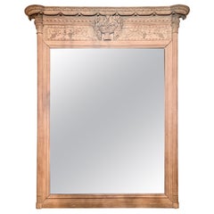 Miroir français ancien de la fin du XIXe siècle en bois naturel finement sculpté