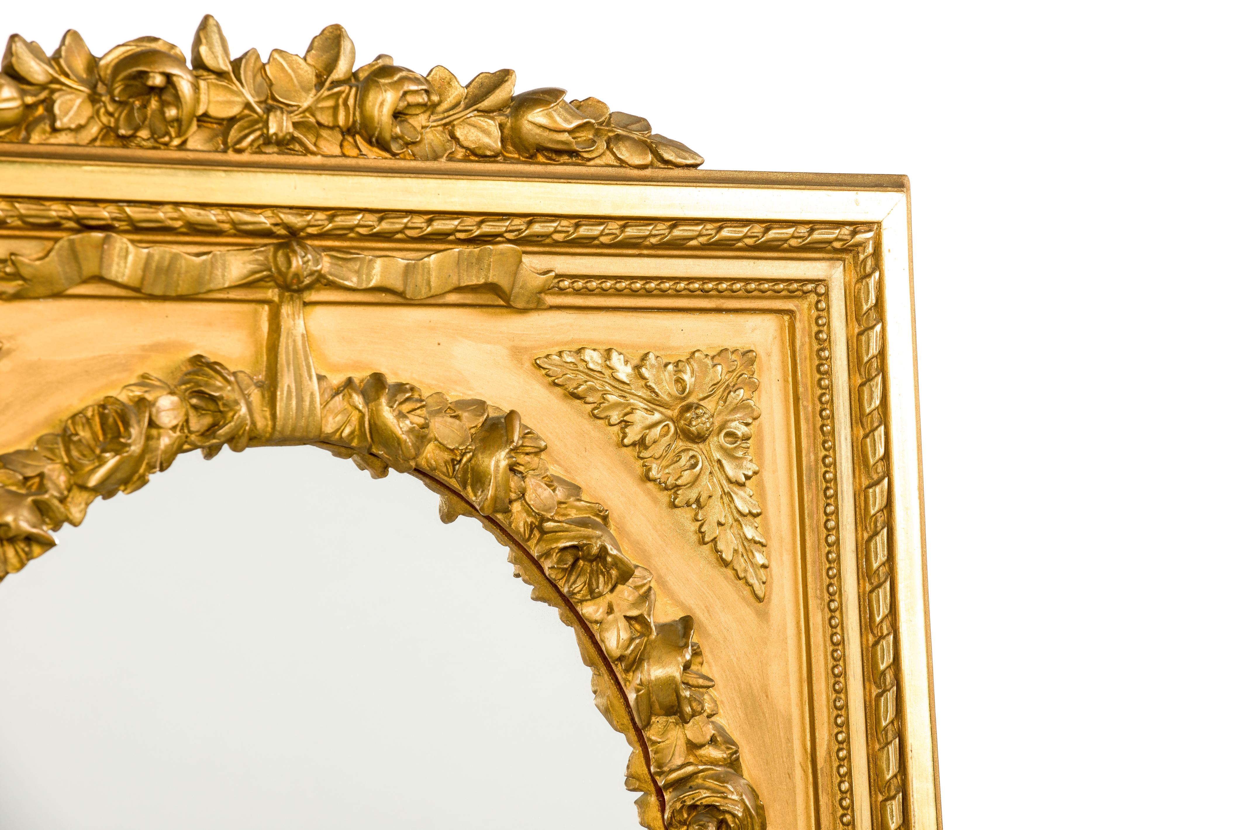 Polished Antique Late 19th Century Louis XVI Gold Gilt French Pier Mirror with Crest For Sale