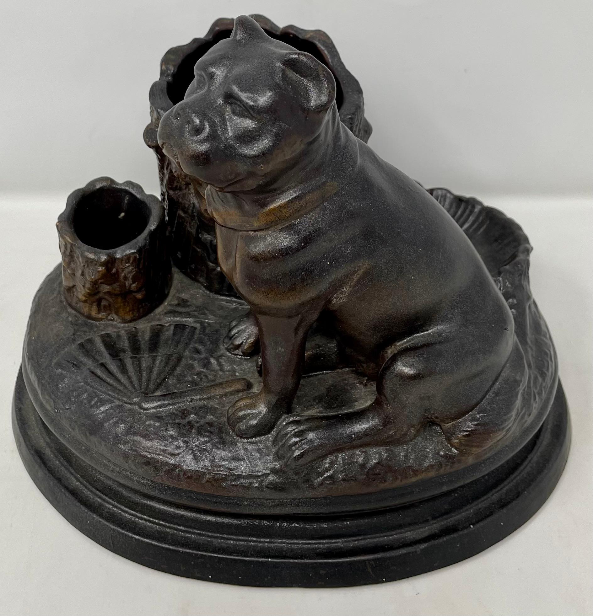 Antique late 19th century salt-glazed pottery figural dog cigar holder with matchstick holder and ashtray.