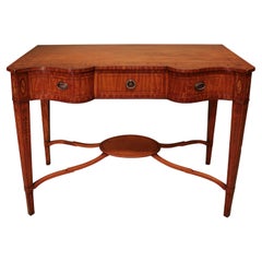 Used late 19th century satinwood serpentine hall table