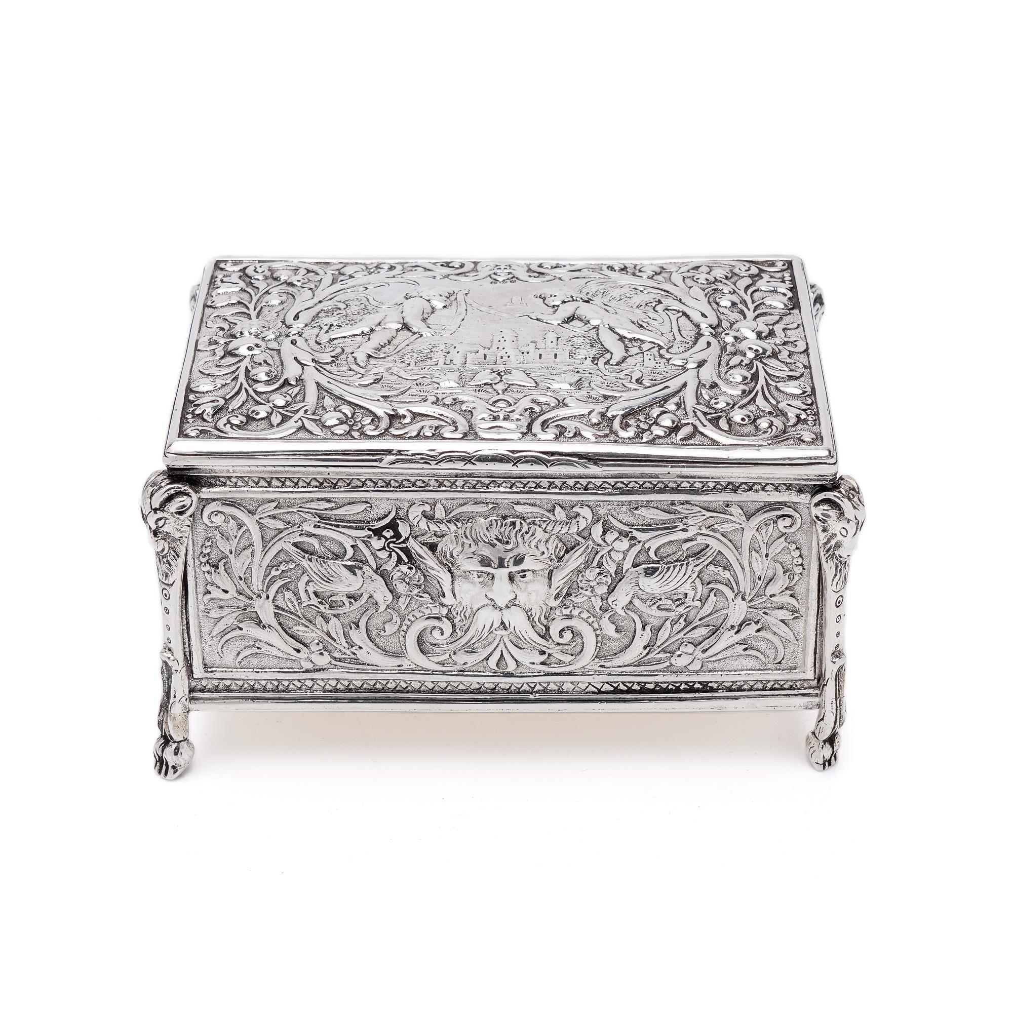 Antique Late 19th century silver repoussé decorated jewellery box with Cherubs, Forest God in the centre surrounded by the birds and floral motifs .

Interior is decorated with green velvet.

Lid top is decorated with two Cherubs ( Putti )