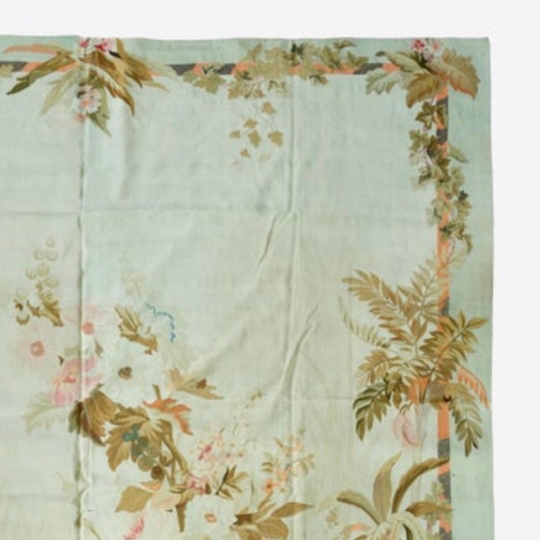 This is a lovely antique late 19th century decorative square light blue French Floral Aubusson 
Tapestry rug. 

This lovely piece is meant to be used as either a floor covering or a wall covering. 

It is a Classic example of the Aubusson style
