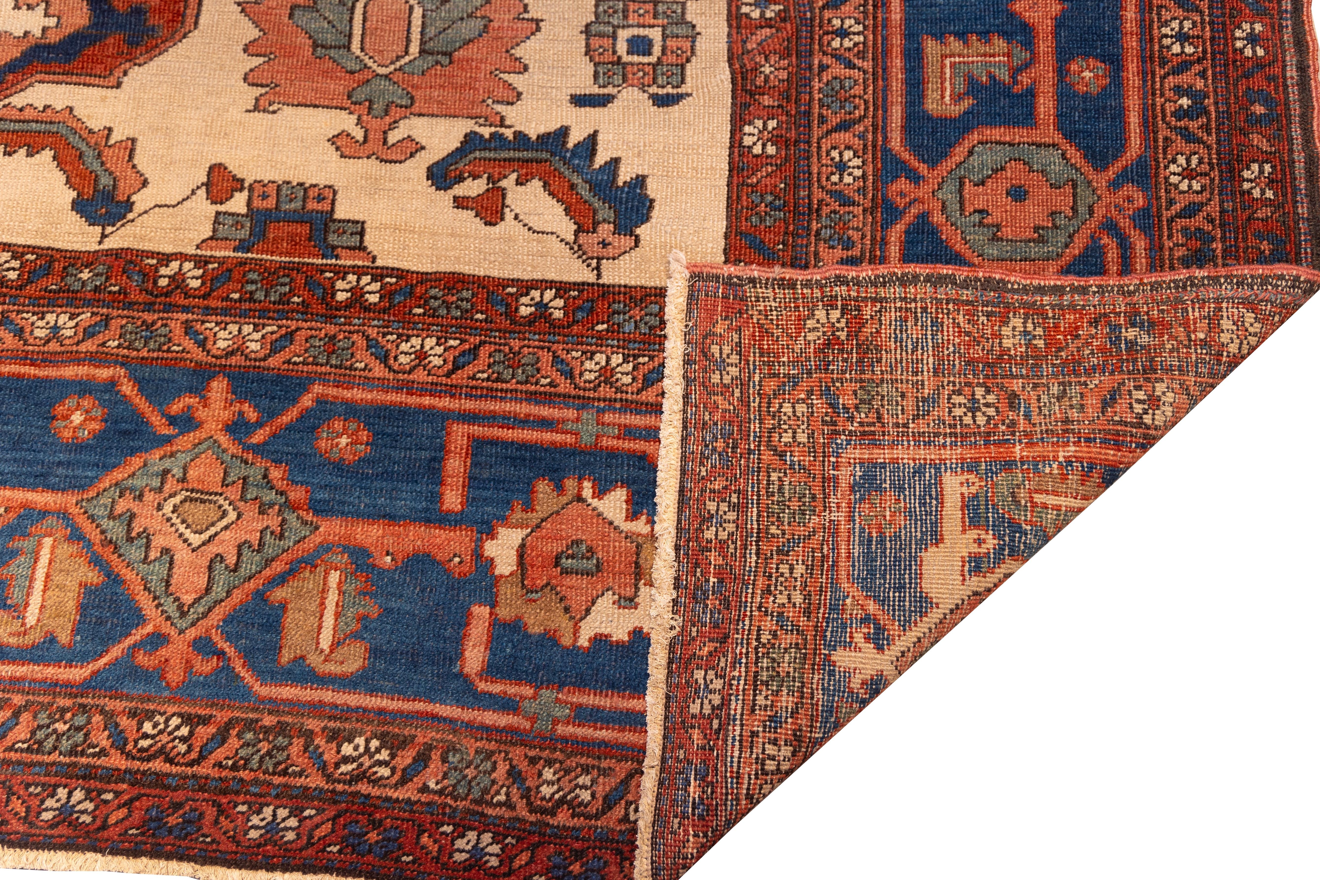 Persian Antique Late 19th century tribal serapi rug For Sale
