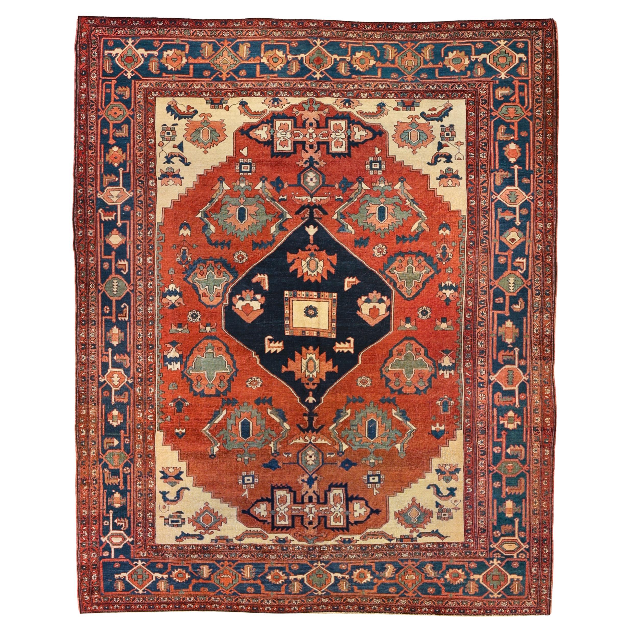Antique Late 19th century tribal serapi rug For Sale