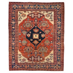 Antique Late 19th century tribal serapi rug