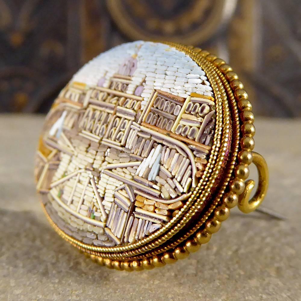 This Antique Late Victorian Brooch features a micro mosaic of St Peters Square, Vatican City. Set in 15ct Gold, this timeless treasure will make charming addition to your antique collection!

Condition: Very Good, slightest signs of wear due to age