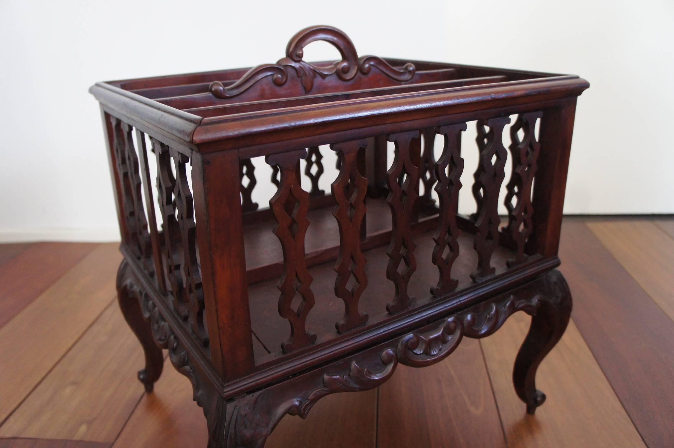 All handcrafted mahogany canterbury from England, circa 1880.

This beautifully shaped Canterbury is real eyecatcher and very practical in everyday life. The elegant, integrated handle on top also makes it easy to move around. This magazine rack