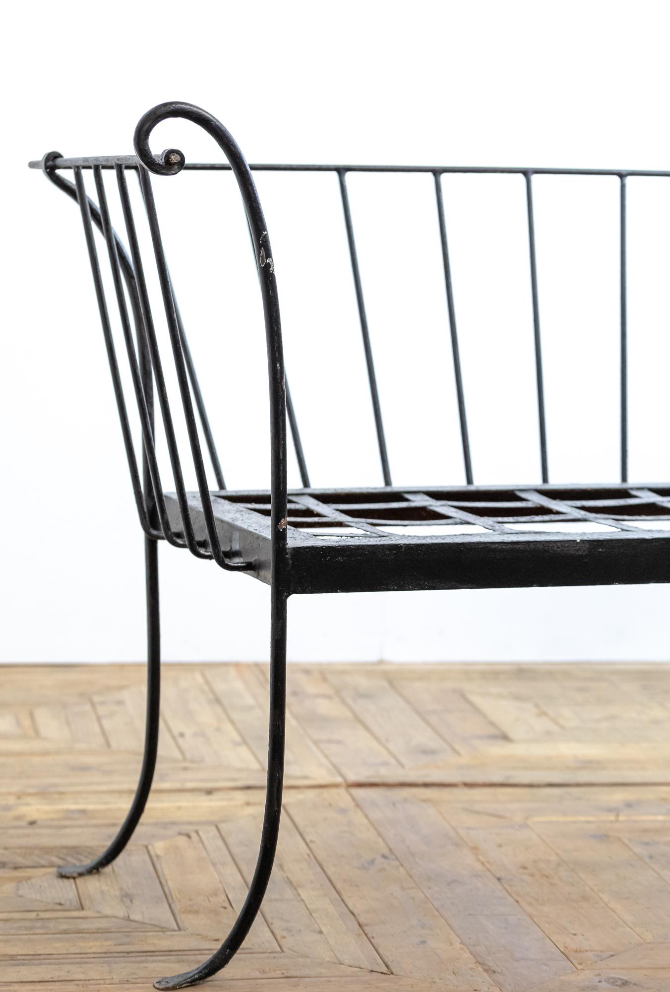A stunning wrought iron sofa in the 