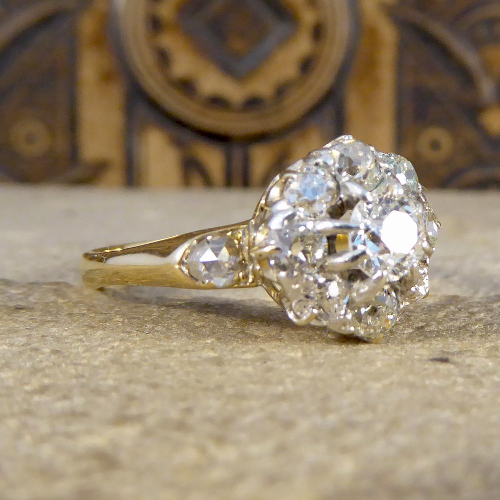 A traditional Victorian Diamond cluster ring from the late 19th century. Hand crafted from 18ct Yellow Gold, the ring features a 9 stone cluster of old cut Diamonds. Each Diamond is completely unique due to having been individually hand cut. Each