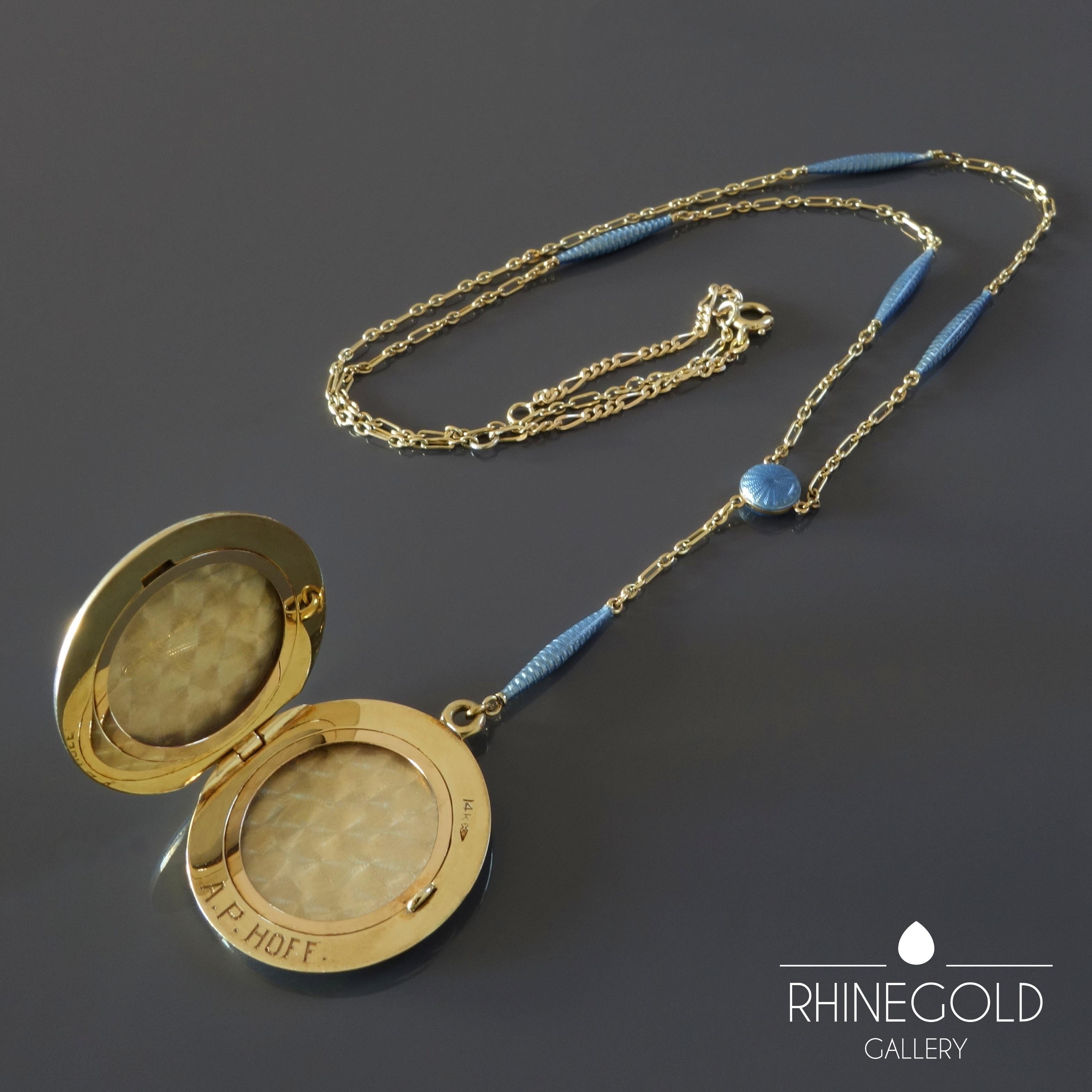 Antique Late Victorian Edwardian Blue Guilloche Enamel Gold Locket 
14k yellow gold, guilloche enamel 
Diameter of locket 2.7 cm (approx. 1 1/16”)
Chain adjustable at 43 cm and 47.5 cm (approx. 16 7/8“ and 18 11/16”)
Weight approx. 17 grams
Marks: