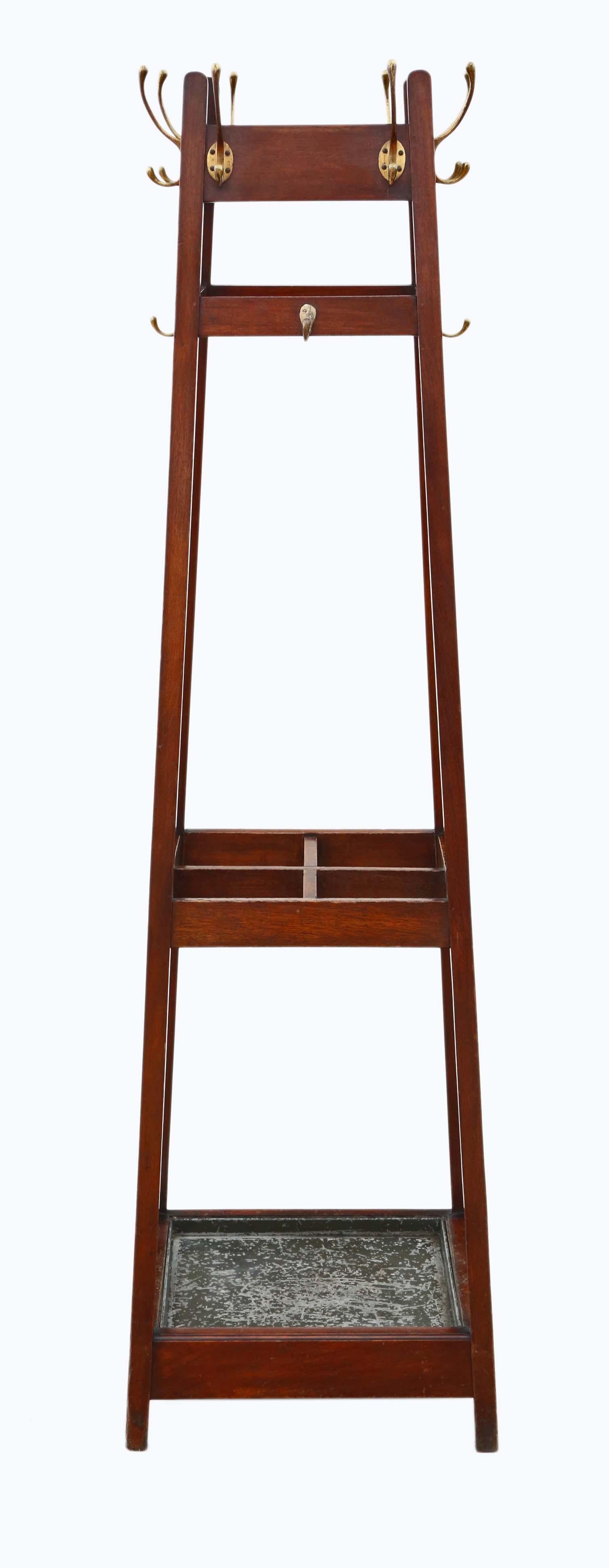 Antique Late Victorian hall, coat, hat, stick, umbrella, stand circa 1900.

We have several of these, all identical, but with differing drip trays (original black and replacement black). Please discuss what we have available before purchase if this
