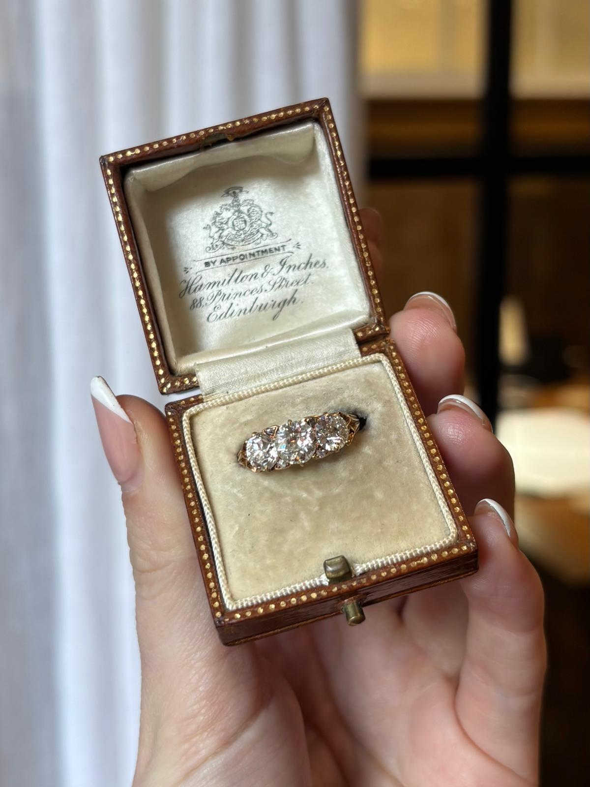 A sparkly antique late Victorian old cut diamond three stone ring set in 18k yellow gold. 

The ring is set with three extremely well matched old cut diamonds, set in a hand carved filigree mount. 

What makes this ring so special is the perfectly