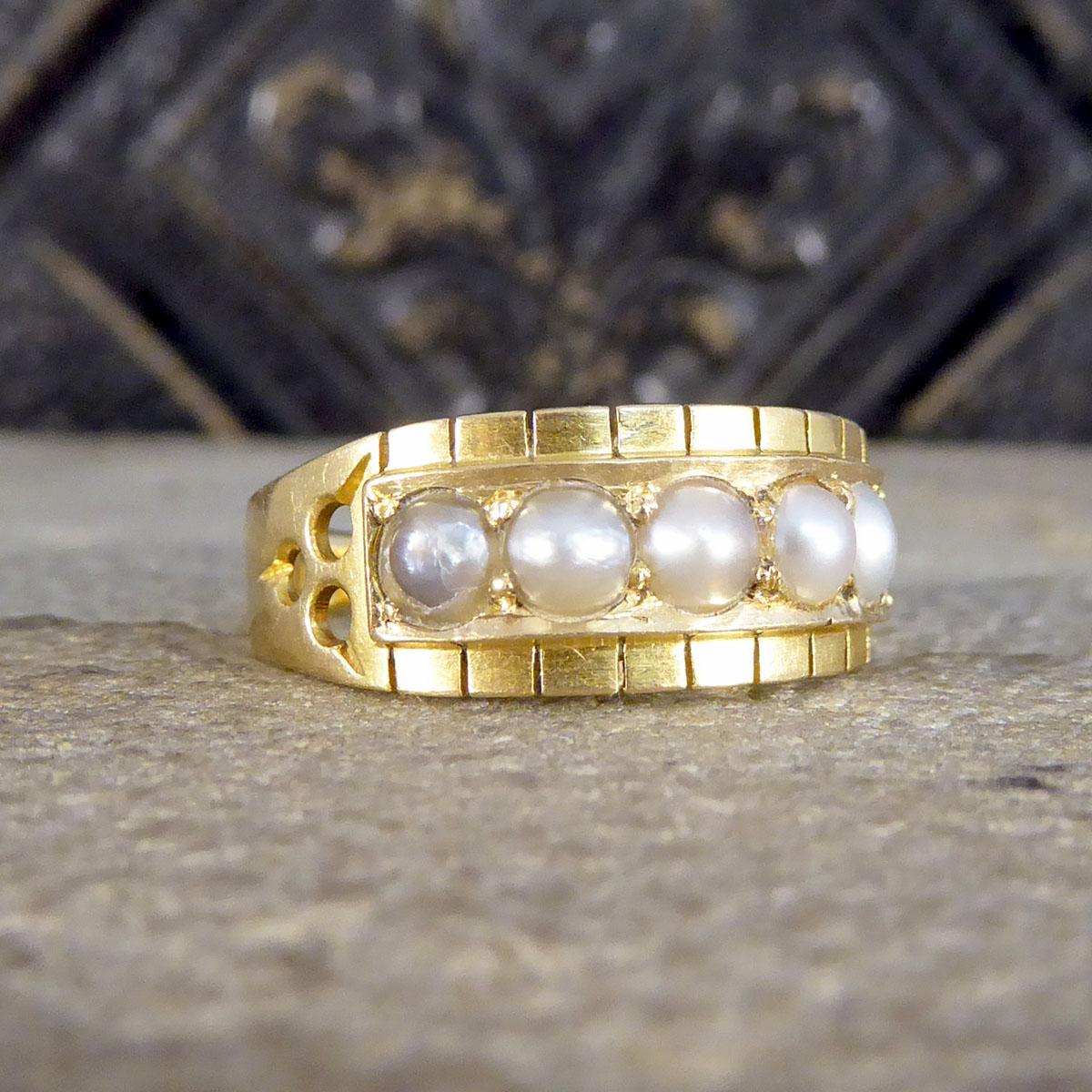 This lovely antique ring was created in the Late Victorian era with a beautifully decorated head to the ring and clear hallmarks on the inside of the band. The hallmarks shows that this ring was hand crafted in Birmingham in 18ct Yellow Gold. It