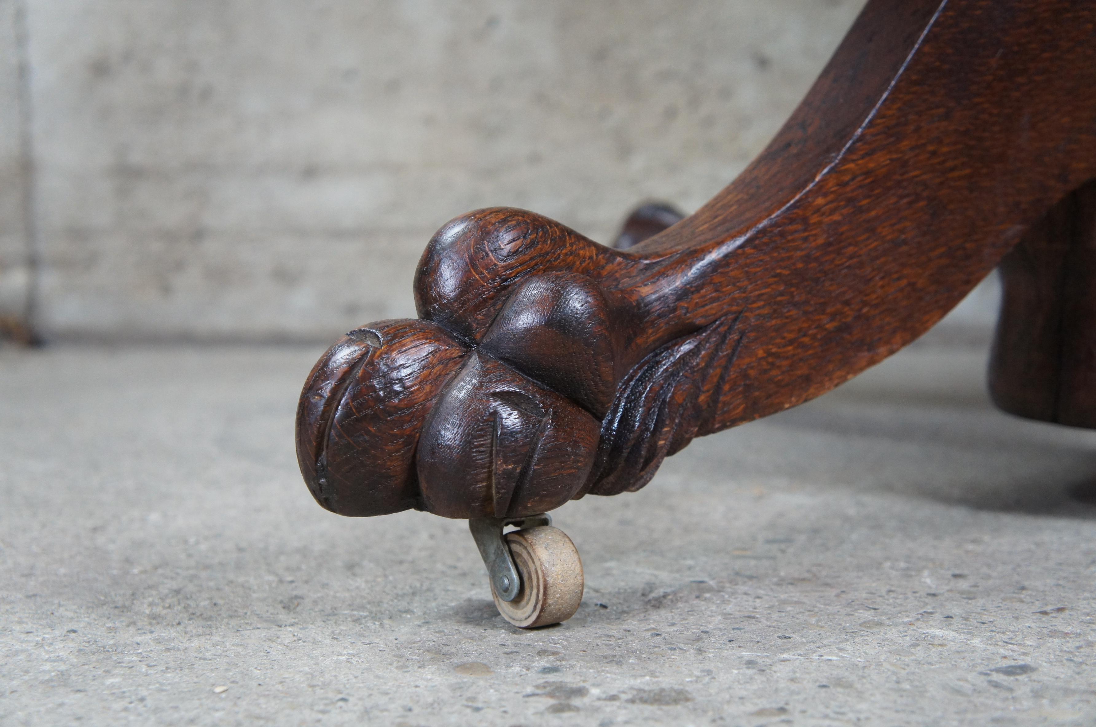 round oak table with claw feet