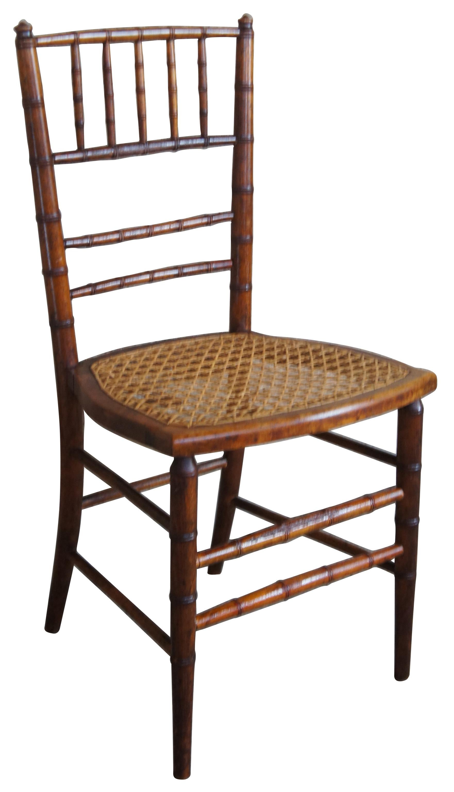 Late Victorian, British Colonial inspired side chair. Made from walnut with spindled bamboo like design and cane seat.
  