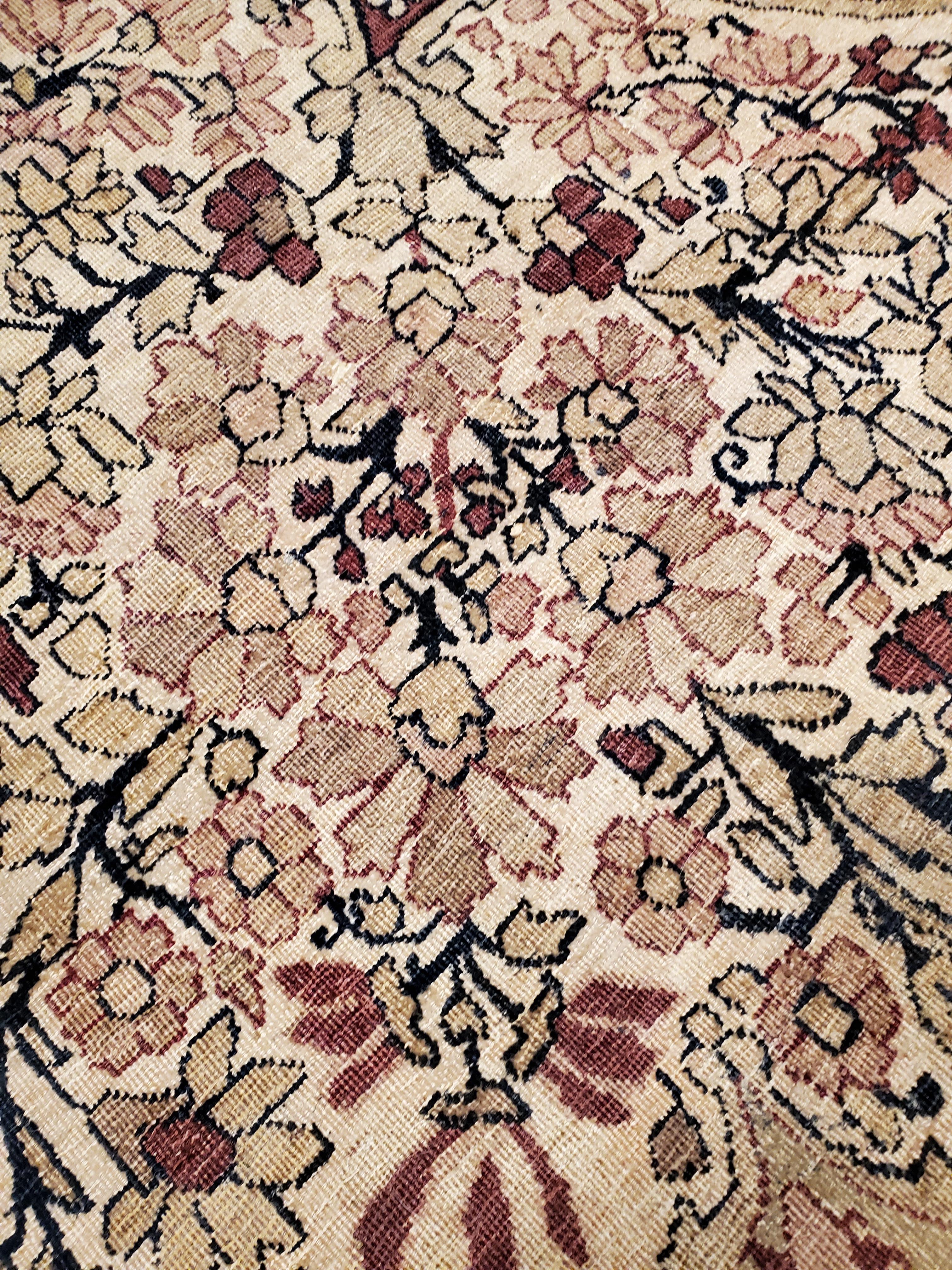 This master crafted Persian Laver Kerman carpet exemplifies the profound understanding of the artistic principles of balance and harmony that make art level antique rugs so inspiring to live with. Indicative of the best classical Persian carpets of
