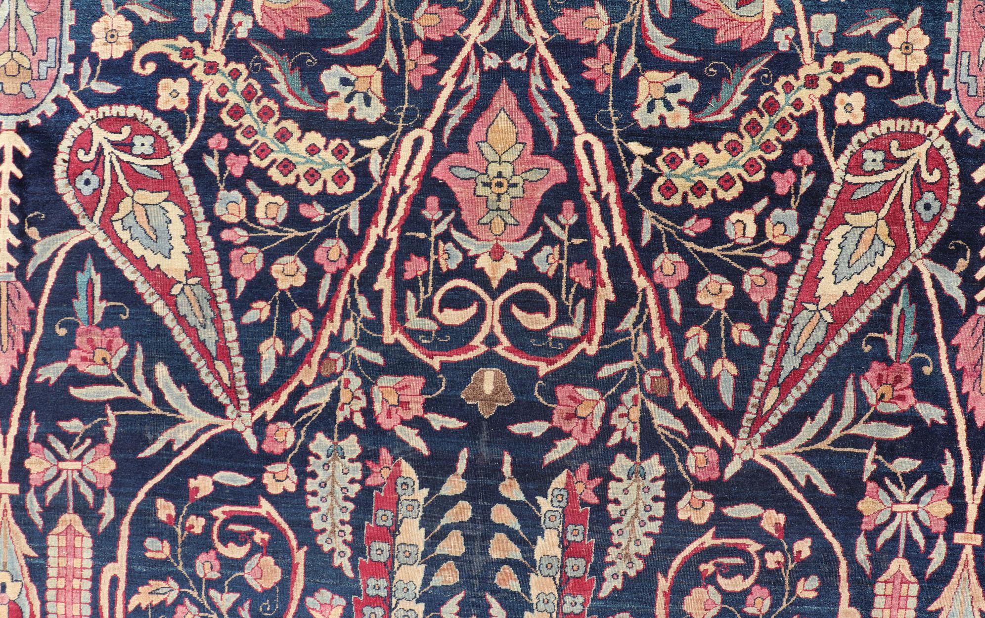 Laine Tapis persan ancien Lavar Kerman avec un motif floral sur un champ bleu en vente