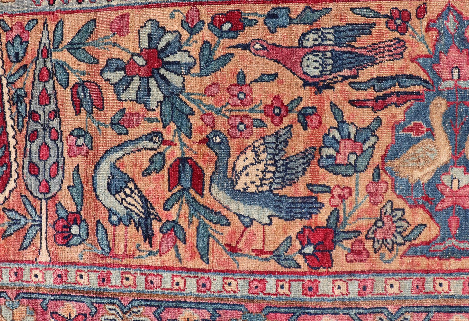 Tapis persan ancien Lavar Kerman avec un motif floral sur un champ bleu en vente 1